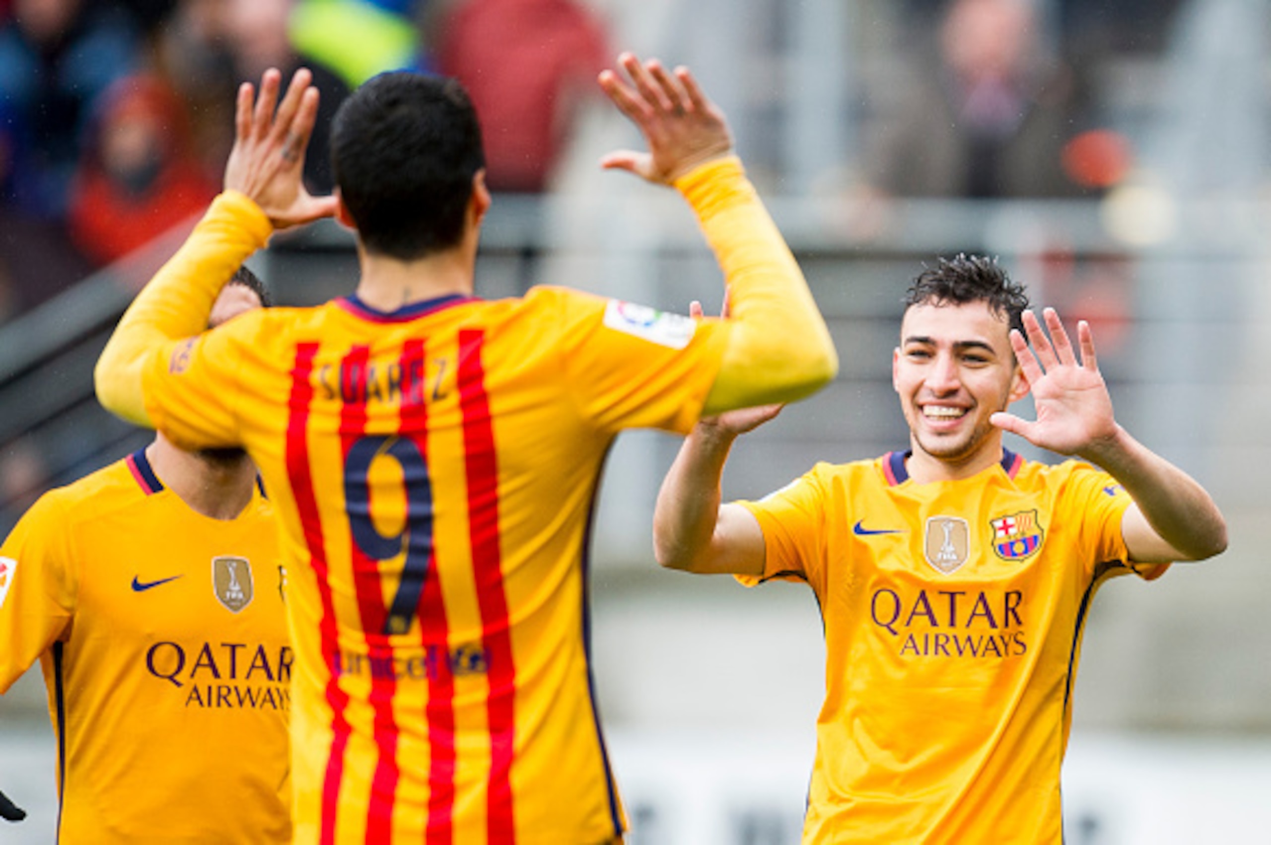 EIBAR, SPAIN - MARCH 06:  Munir El Haddadi of FC Barcelona celebrates with his teammate Luis Suarez of FC Barcelona after scoring the opening goal during the La Liga match between SD Eibar and FC Barcelona at Ipurua Municipal Stadium on March 6, 2016 in E