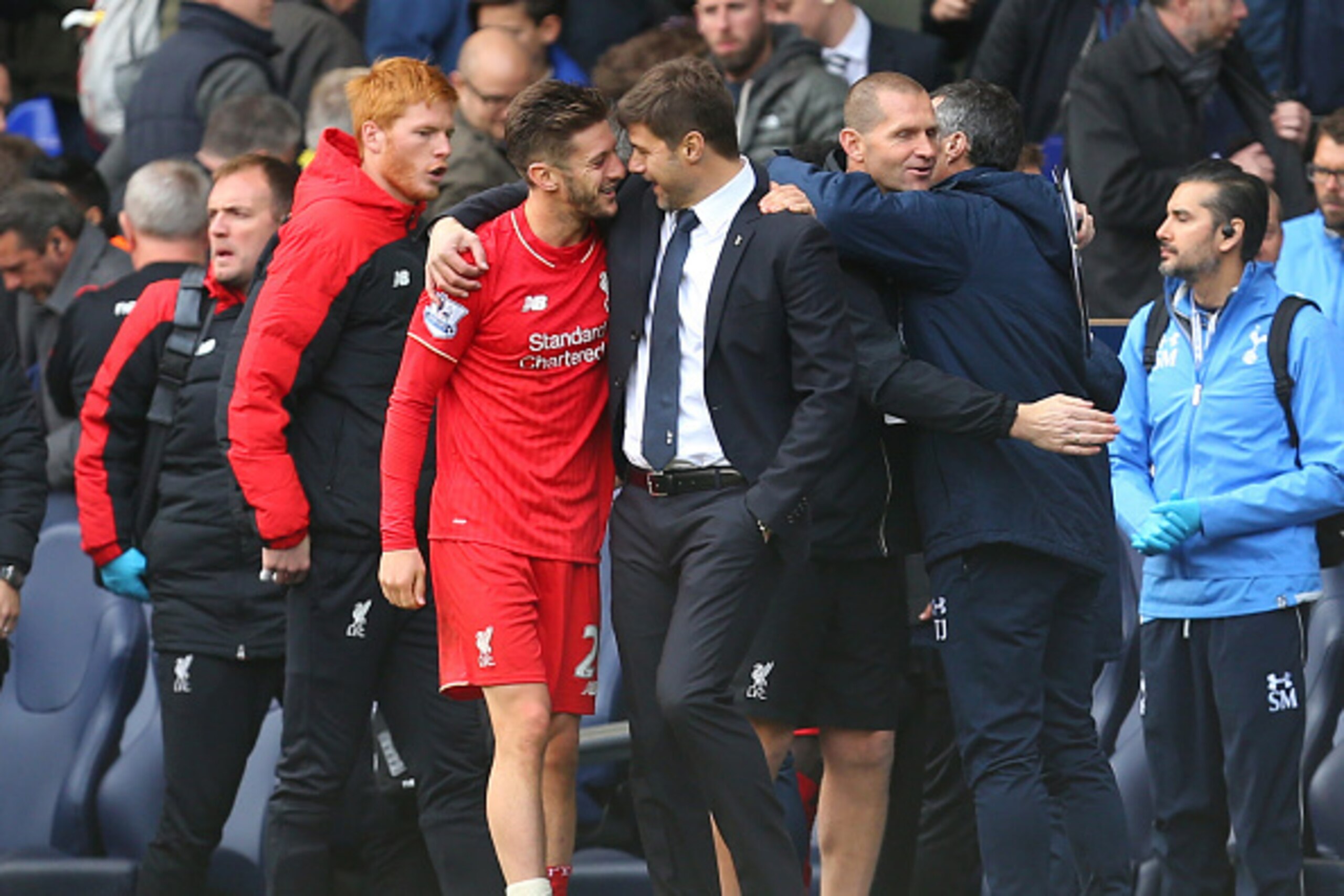 LONDON, ENGLAND - OCTOBER 17:  Adam Lallana of Liverpool hugs Mauricio Pochettino manager of Tottenham Hotspur after the Barclays Premier League match between Tottenham Hotspur and Liverpool at White Hart Lane on October 17, 2015 in London, England.  (Pho