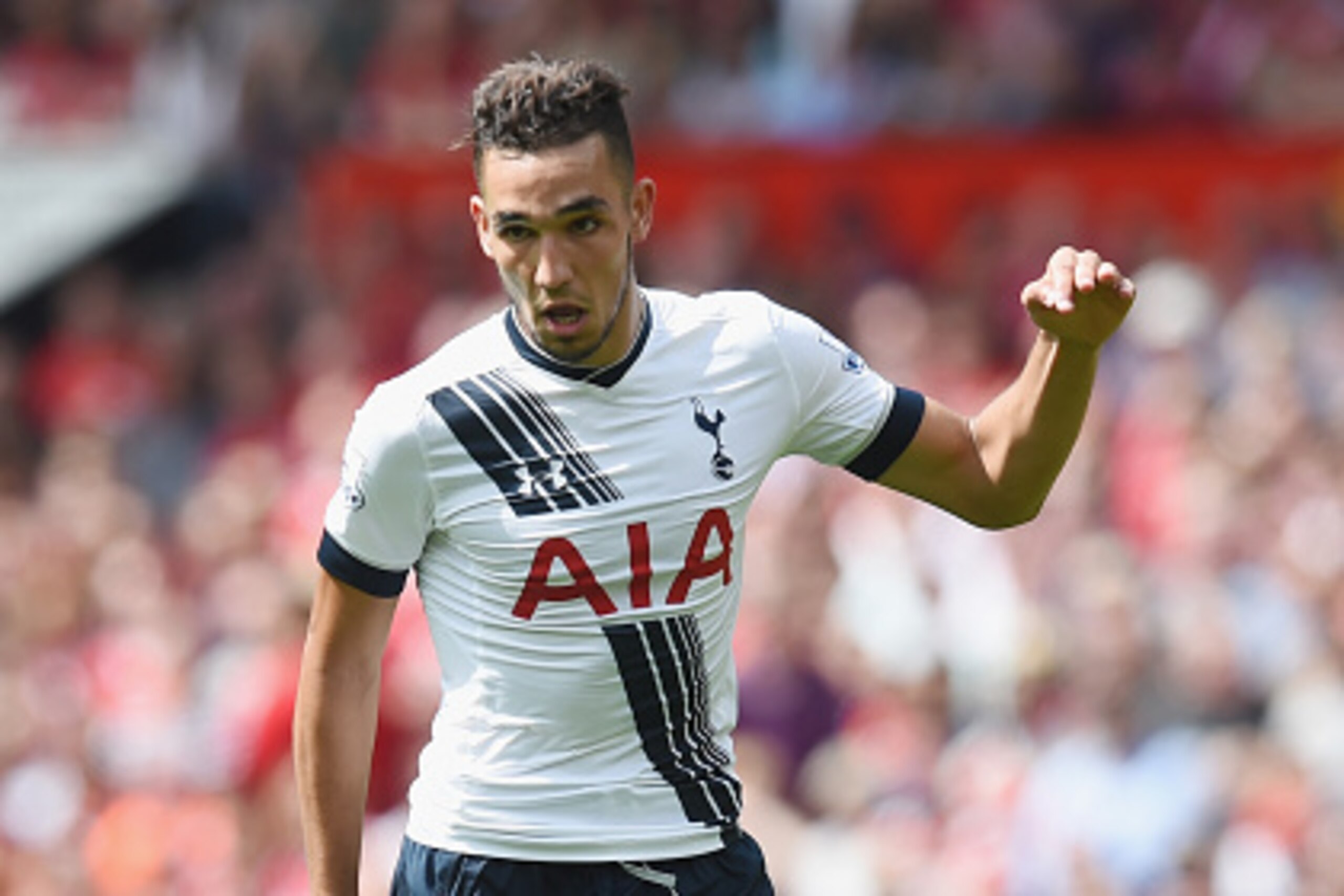 MANCHESTER, ENGLAND - AUGUST 08:  Nabil Bentaleb of Tottenham in action during the Barclays Premier League match between Manchester United and and Tottingham Hotspur at Old Trafford, Manchester.  (Photo by Michael Regan/Getty Images)