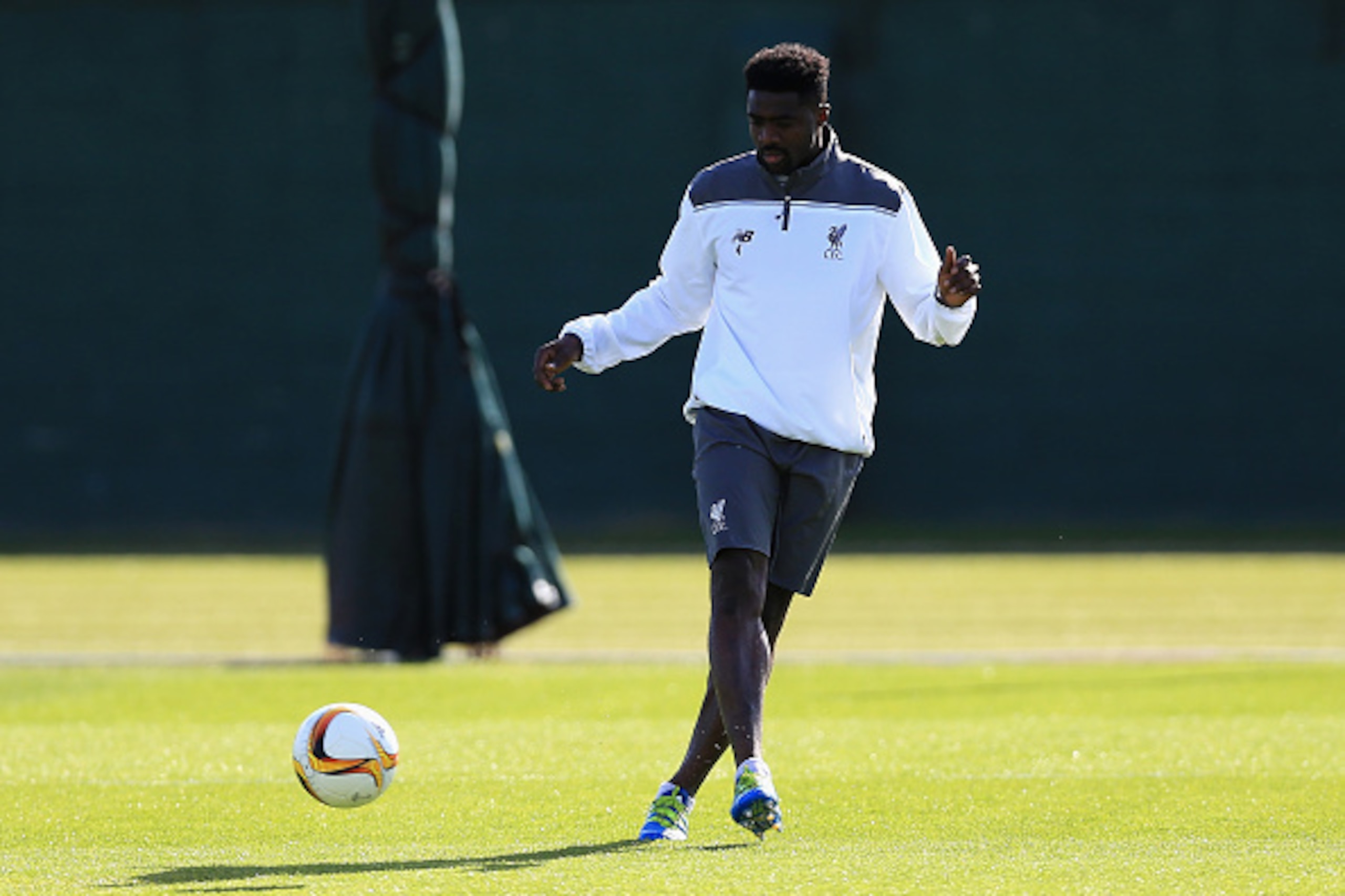 LIVERPOOL, ENGLAND - MAY 04:  Kolo Toure of Liverpool warms up during a training session ahead of the UEFA Europa League Semi-Final Second Leg match against Villarreal at Melwood Training Ground on May 4, 2016 in Liverpool, England.  (Photo by Clint Hughe