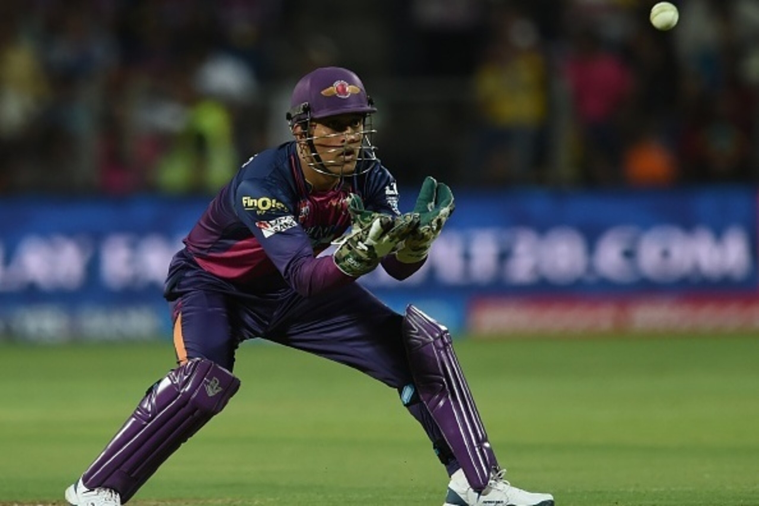 Rising Pune Supergiants captain Mahendra Singh Dhoni collects a throw from the outfield during the 2016 Indian Premier League (IPL) Twenty20 cricket match between Rising Pune Supergiants and Gujarat Lions at The Maharashtra Cricket Association Stadium in Rising Pune Supergiants captain Mahendra Singh Dhoni collects a throw from the outfield during the 2016 Indian Premier League (IPL) Twenty20 cricket match between Rising Pune Supergiants and Gujarat Lions at The Maharashtra Cricket Association Stadium in