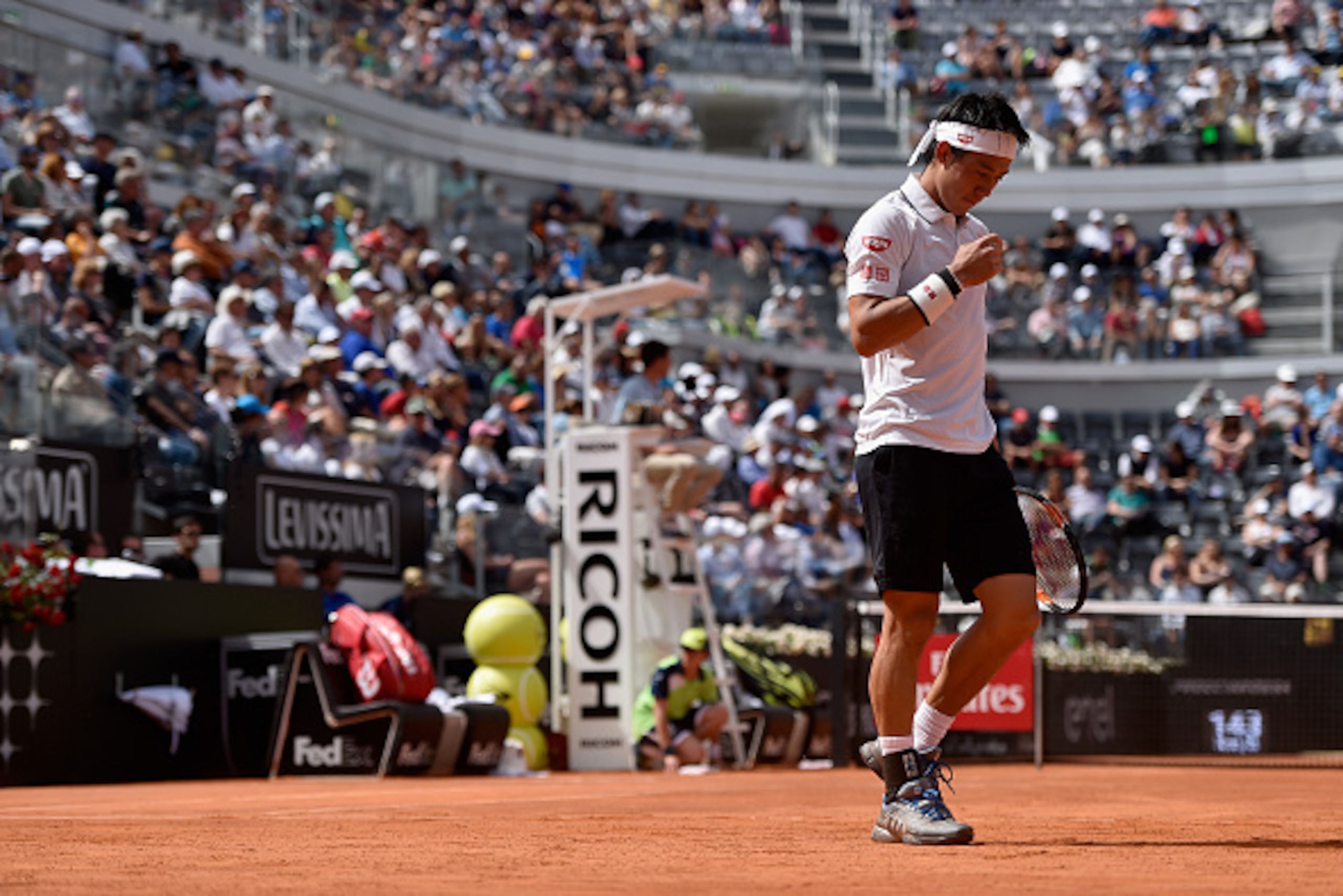 ROME, ITALY - MAY 10:  Kei Nishikori of Japan reacts during his match against Viktor Troicki of Serbia on Day Three of The Internazionali BNL d'Italia 2016 on May 10, 2016 in Rome, Italy.  (Photo by Dennis Grombkowski/Getty Images)