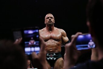 Wrestler Triple H poses during a show at the AccorHotels Arena in Paris, as part of the WrestleMania Revenge Tour, the World Wrestling Entertainment (WWE) European tour, on April 22, 2016.  / AFP / THOMAS SAMSON        (Photo credit should read THOMAS SAM