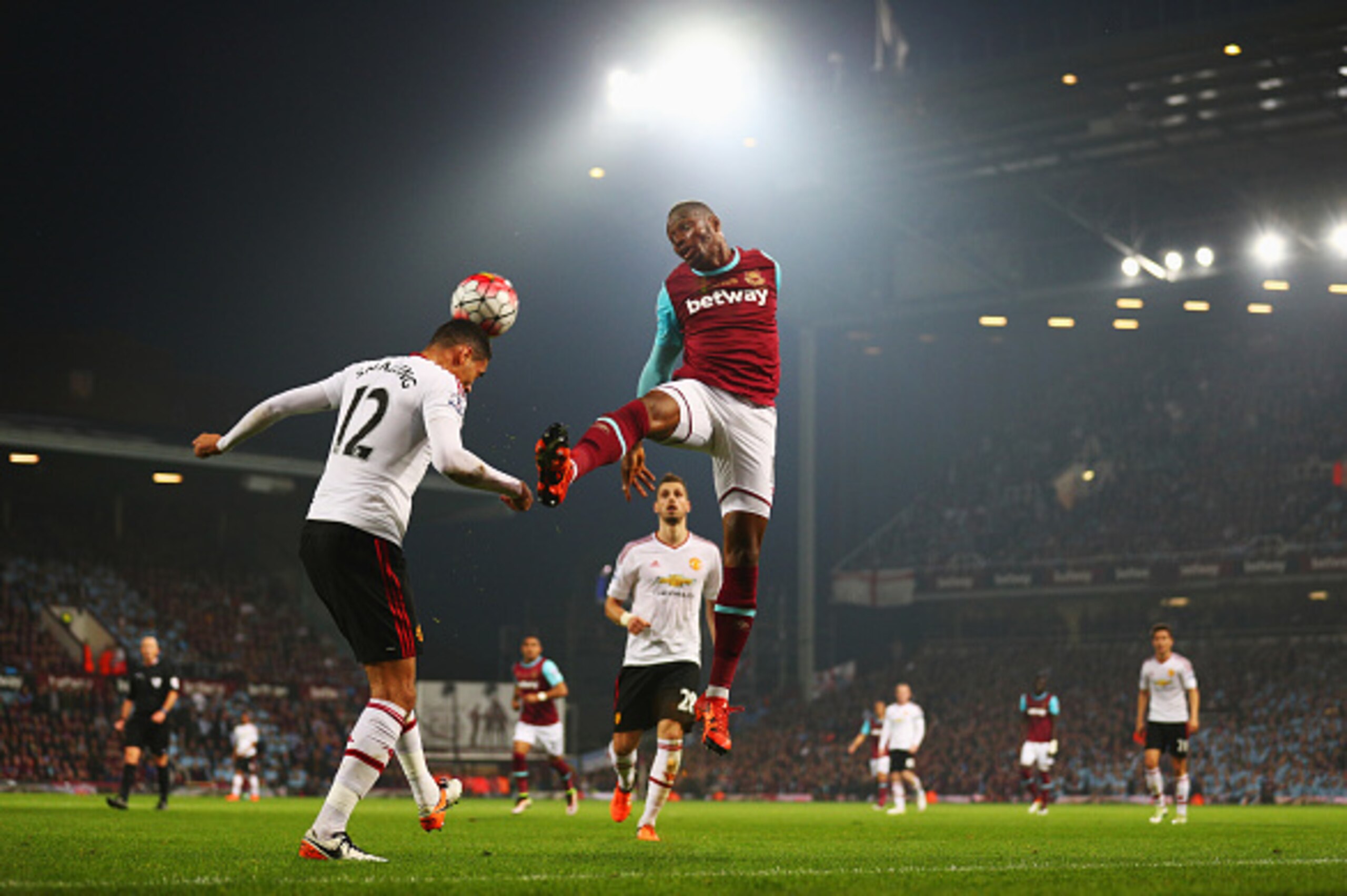 LONDON, ENGLAND - MAY 10: Diafra Sakho of West Ham United and Chris Smalling of Manchester United battle for the ball during the Barclays Premier League match between West Ham United and Manchester United at the Boleyn Ground on May 10, 2016 in London, E LONDON, ENGLAND - MAY 10: Diafra Sakho of West Ham United and Chris Smalling of Manchester United battle for the ball during the Barclays Premier League match between West Ham United and Manchester United at the Boleyn Ground on May 10, 2016 in London, E