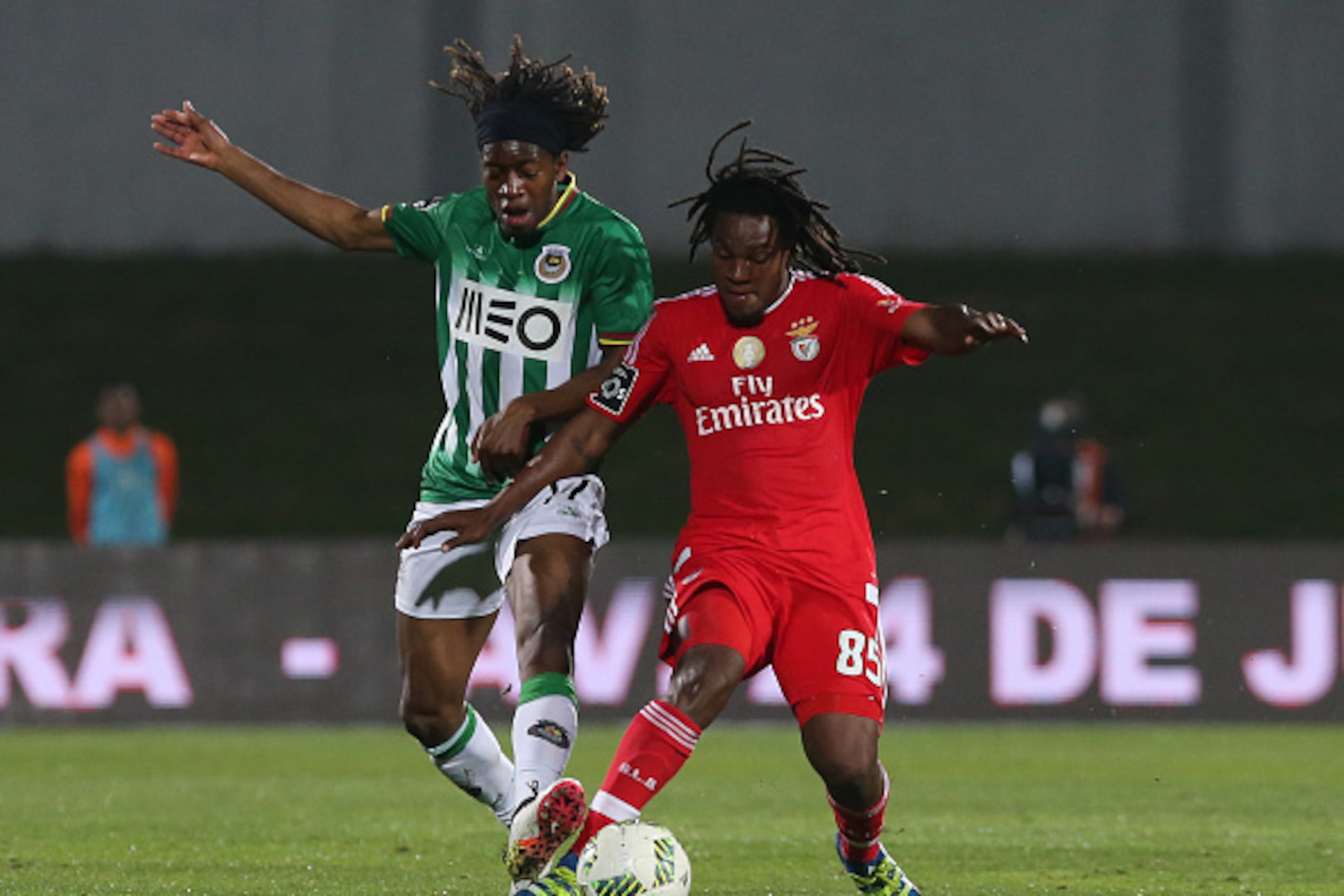 VILA DO CONDE, PORTUGAL - APRIL 24: SL Benfica's midfielder Renato Sanches with Rio Ave FC's midfielder Joris Kayembe in action during the Primeira Liga match between Rio Ave FC and SL Benfica at Estadio dos Arcos on April 24, 2016 in Lisbon, Portugal. (P