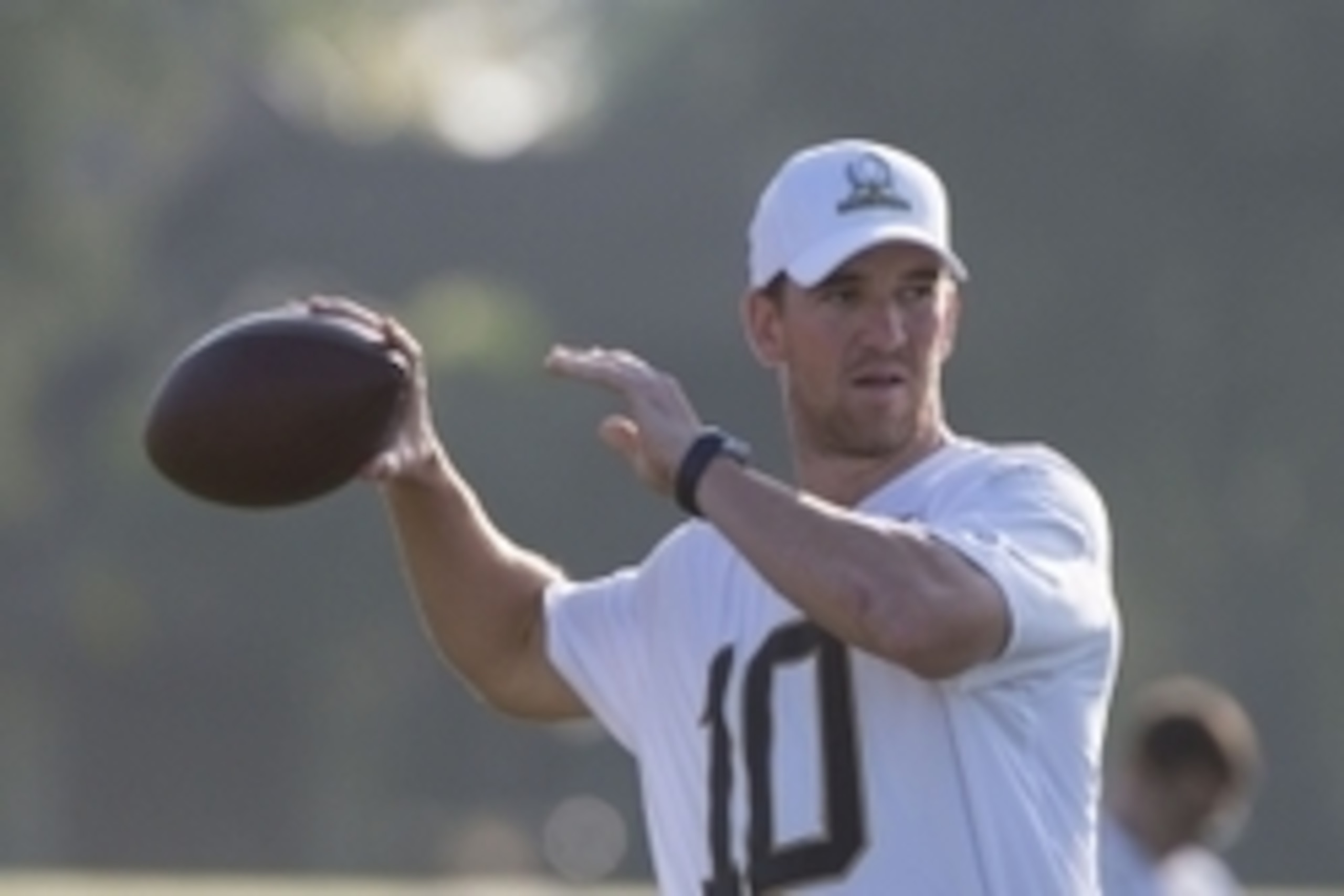 January 30, 2016; Kahuku, HI, USA; Team Rice quarterback Eli Manning of the New York Giants (10) passes the football during the 2016 Pro Bowl practice at Turtle Bay Resort. Mandatory Credit: Kyle Terada-USA TODAY Sports