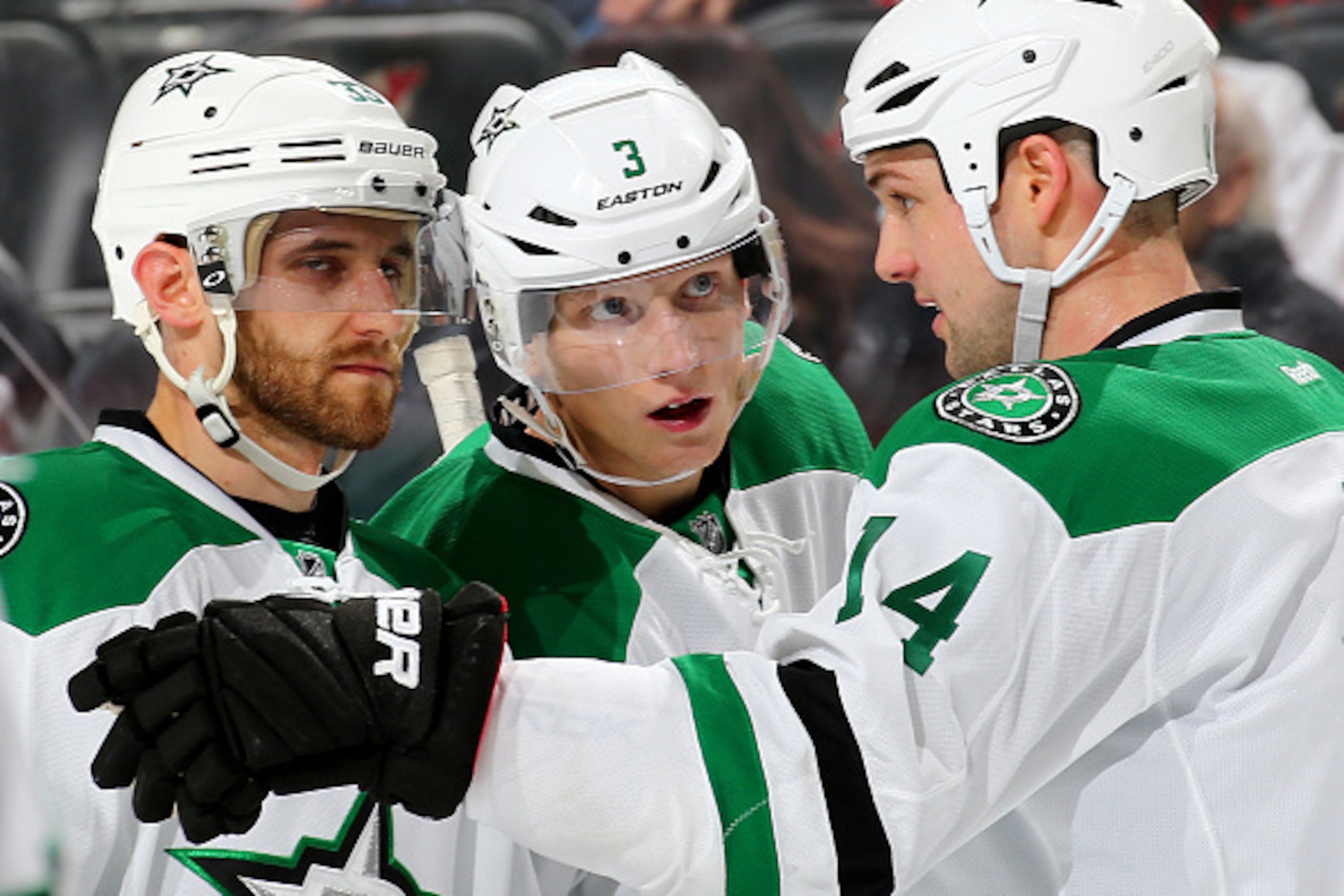 NEWARK, NJ - JANUARY 02:  Alex Goligoski #33 and John Klingberg #3 of the Dallas Stars listen to directions from Jamie Benn #14 before a faceoff against the New Jersey Devils on January 2,2016 at Prudential Center in Newark, New Jersey.The New Jersey Devi