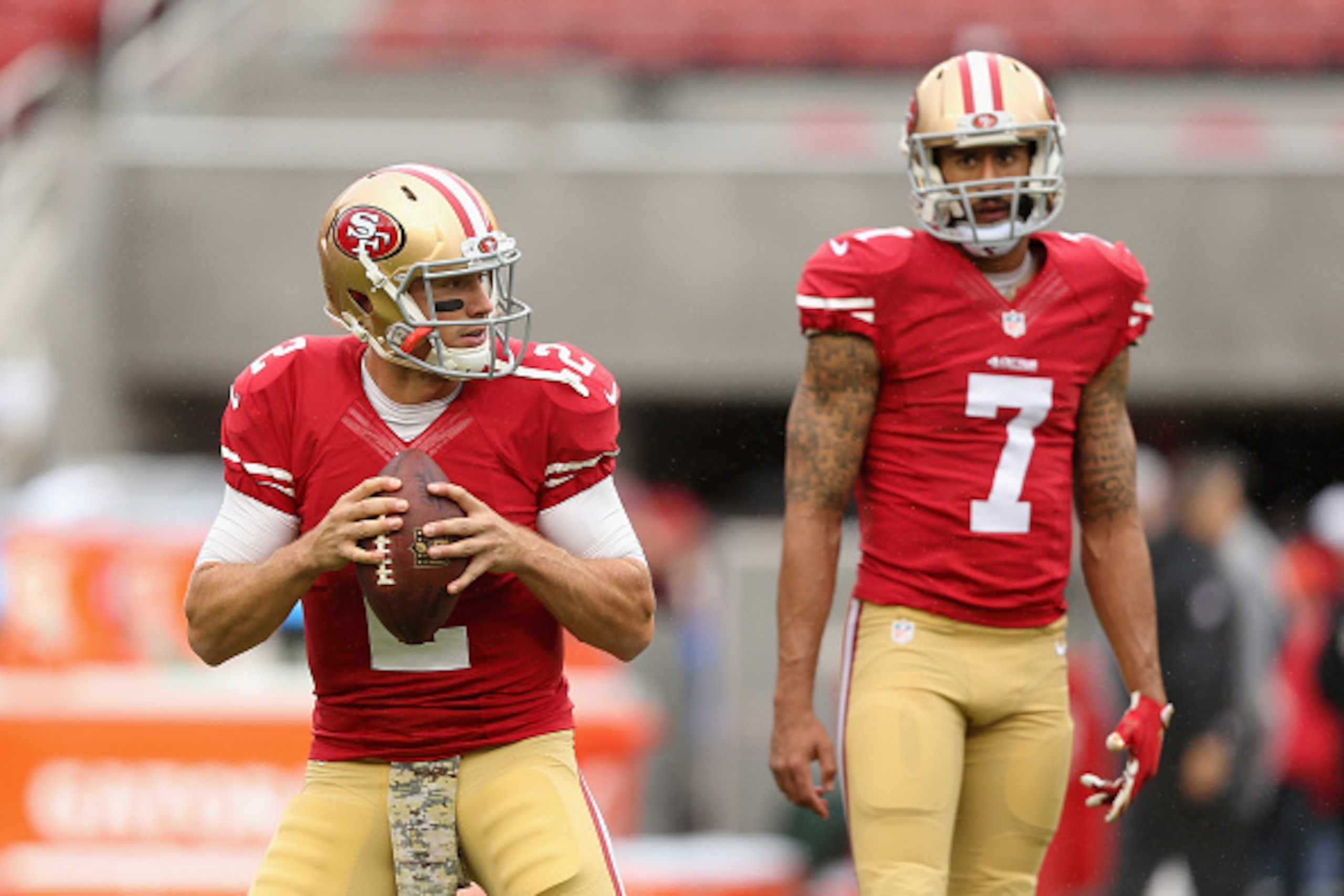 SANTA CLARA, CA - NOVEMBER 08:  Colin Kaepernick #7 watches Blaine Gabbert #2 of the San Francisco 49ers warm up before their game against the Atlanta Falcons at Levi's Stadium on November 8, 2015 in Santa Clara, California.  (Photo by Ezra Shaw/Getty Ima