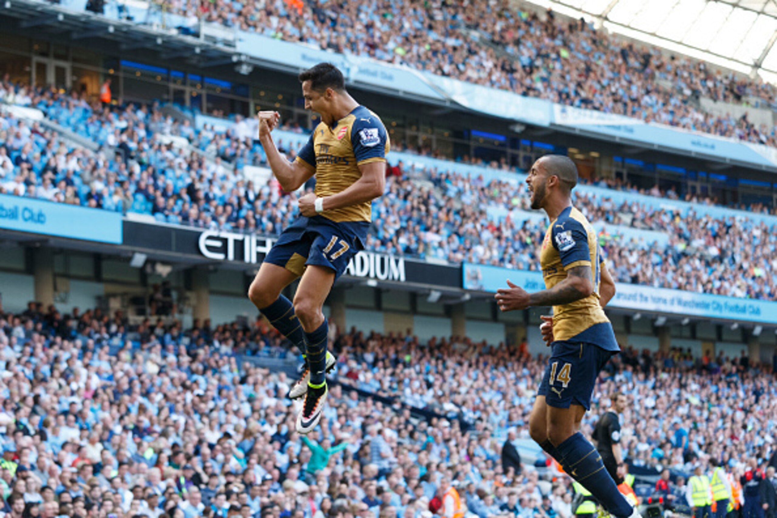 MANCHESTER, ENGLAND - MAY 08:  Alexis Sanchez of Arsenal celebrates after scoring a goal to make it 2-2 during the Barclays Premier League match between Manchester City and Arsenal at the Ethiad Stadium on May 1, 2016 in Manchester, United Kingdom. (Photo