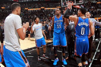 SAN ANTONIO, TX - MAY 10: Russell Westbrook #0 and Kevin Durant #35 of the Oklahoma City Thunder high five each other after the game against the San Antonio Spurs in Game Five of the Western Conference Semifinals during the 2016 NBA Playoffs on May 10, 20