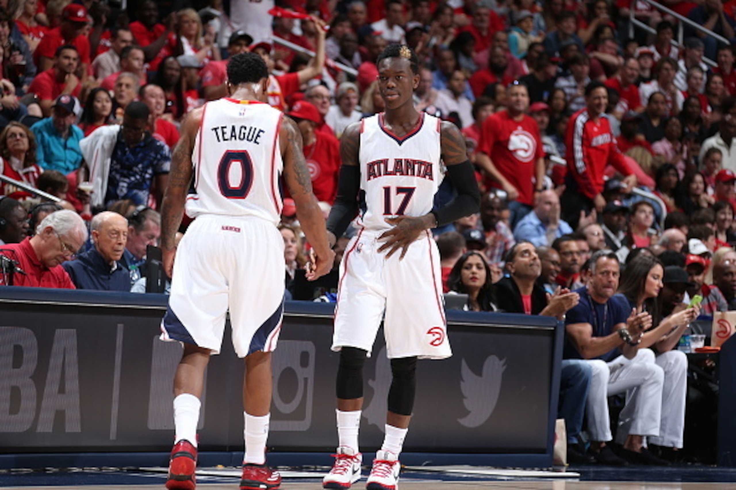 ATLANTA, GA - APRIL 19: Jeff Teague #0 and Dennis Schroder #17 of the Atlanta Hawks shake hands during the game against the Brooklyn Nets in Game One of the Eastern Conference Quarterfinals during the NBA Playoffs on April 19, 2015 at Philips Arena in At ATLANTA, GA - APRIL 19: Jeff Teague #0 and Dennis Schroder #17 of the Atlanta Hawks shake hands during the game against the Brooklyn Nets in Game One of the Eastern Conference Quarterfinals during the NBA Playoffs on April 19, 2015 at Philips Arena in At