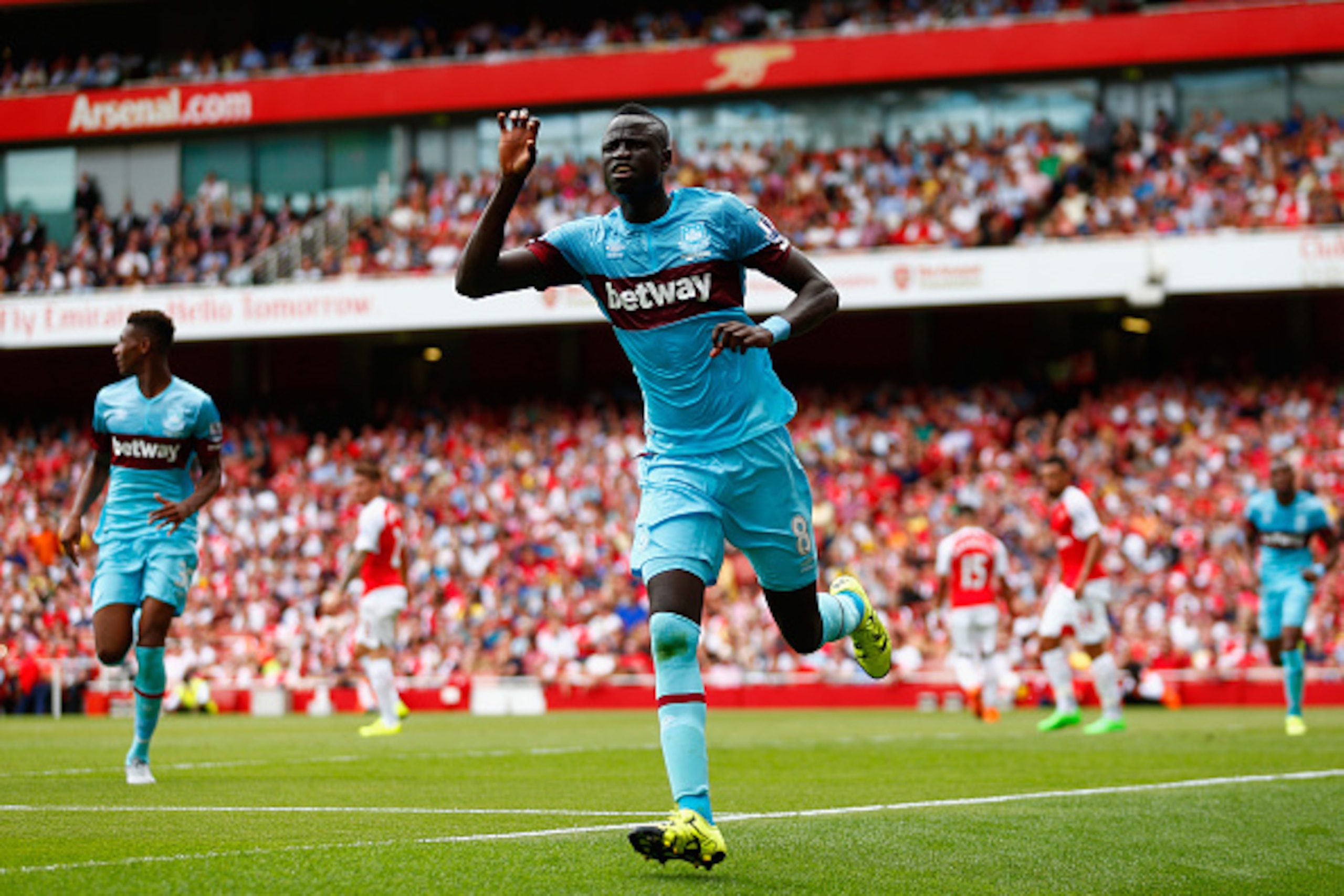 LONDON, ENGLAND - AUGUST 09:  Cheikhou Kouyate of West Ham United celebrates scoring the opening goal during the Barclays Premier League match between Arsenal and West Ham United at the Emirates Stadium on August 9, 2015 in London, England.  (Photo by Jul