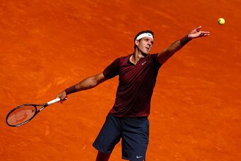 MADRID, SPAIN - MAY 03:  Juan Martin Del Potro of Argentina serves to Dominic Thiem of Austria during day four of the Mutua Madrid Open tennis tournament at the Caja Magica on May 03, 2016 in Madrid, Spain.  (Photo by Julian Finney/Getty Images)