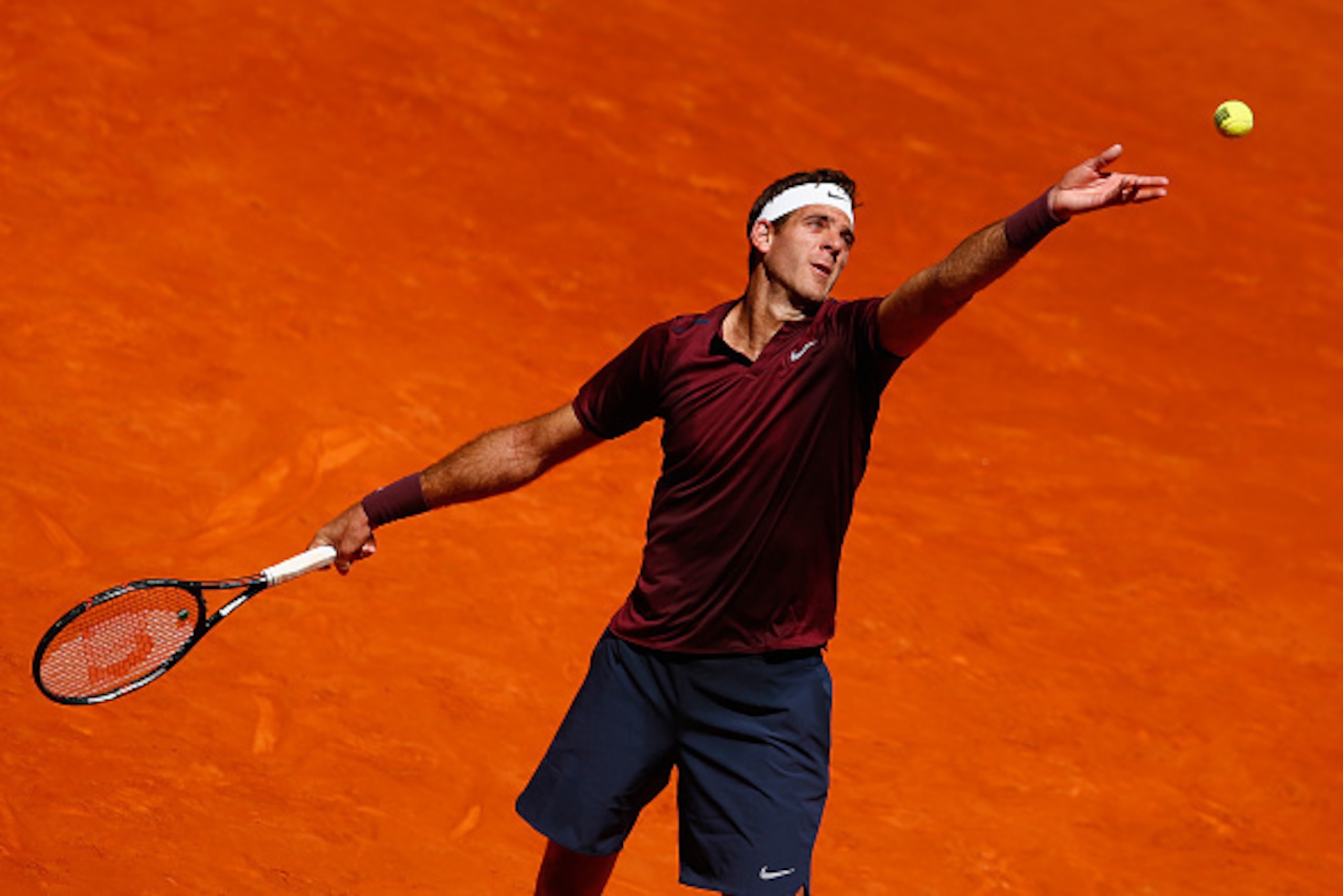 MADRID, SPAIN - MAY 03:  Juan Martin Del Potro of Argentina serves to Dominic Thiem of Austria during day four of the Mutua Madrid Open tennis tournament at the Caja Magica on May 03, 2016 in Madrid, Spain.  (Photo by Julian Finney/Getty Images)