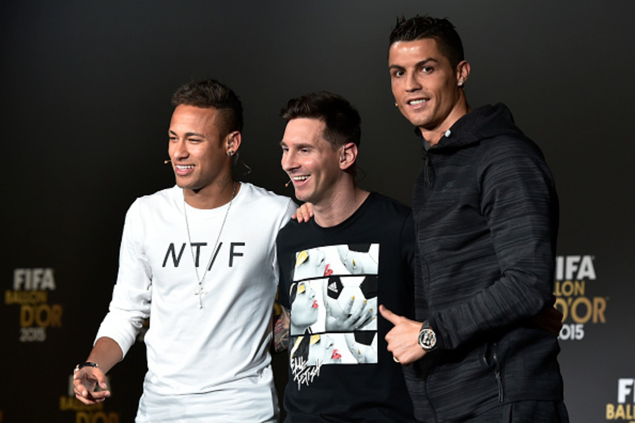 (From L) FC Barcelona and Brazils forward Neymar, FC Barcelona and Argentina's forward Lionel Messi and Real Madrid and Portugal's forward Cristiano Ronaldo pose after a press conference ahead of the 2015 FIFA Ballon d'Or award ceremony at the Kongresshau