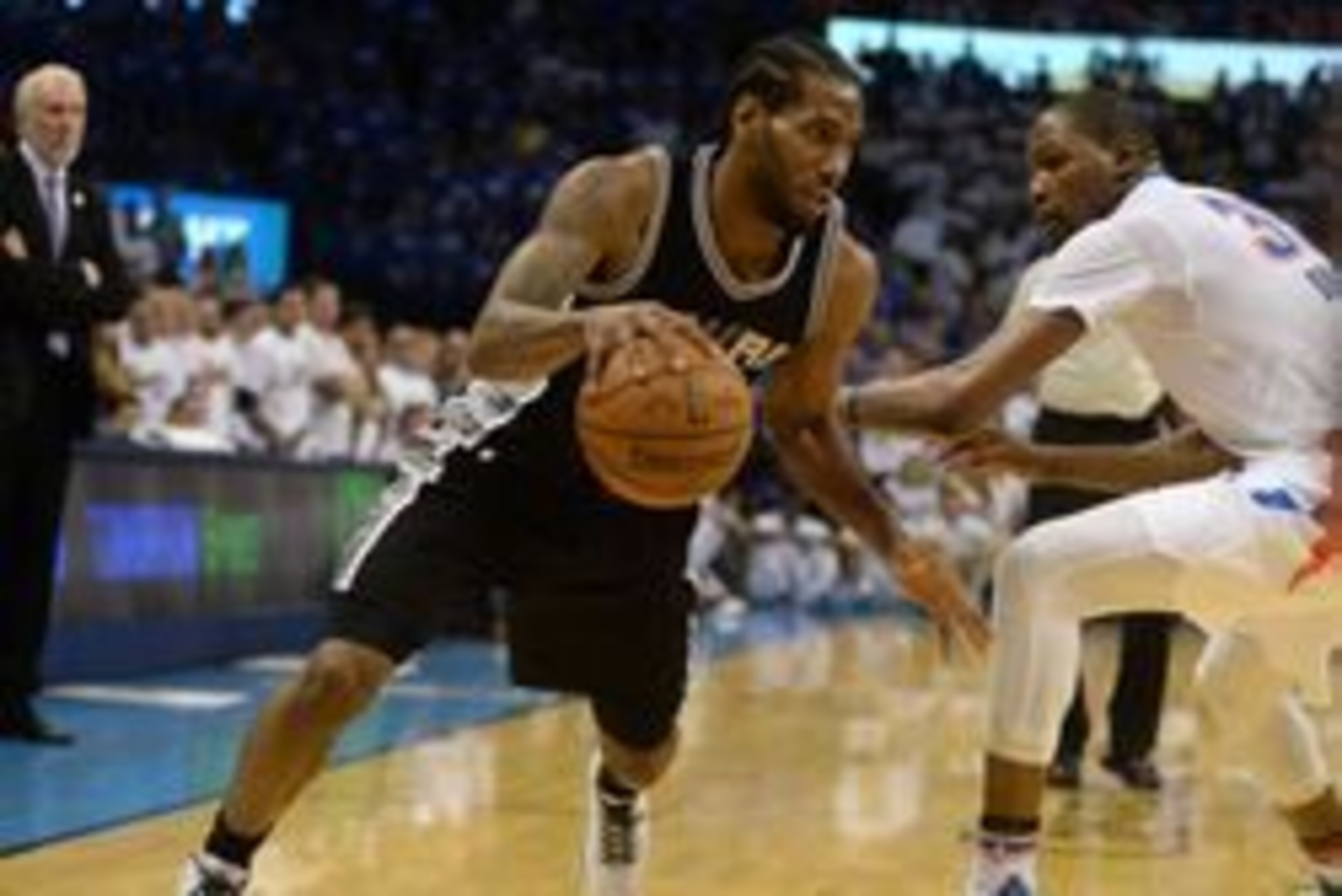 May 6, 2016; Oklahoma City, OK, USA; San Antonio Spurs forward Kawhi Leonard (2) drives to the basket in front of Oklahoma City Thunder forward Kevin Durant (35) during the fourth quarter in game three of the second round of the NBA Playoffs at Chesapeake May 6, 2016; Oklahoma City, OK, USA; San Antonio Spurs forward Kawhi Leonard (2) drives to the basket in front of Oklahoma City Thunder forward Kevin Durant (35) during the fourth quarter in game three of the second round of the NBA Playoffs at Chesapeake