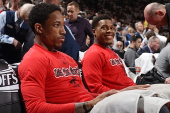 TORONTO, ON - MAY 11: DeMar DeRozan #10 and Kyle Lowry #7 of the Toronto Raptors before facing the Miami Heat for Game Five of the Eastern Conference Semifinals during the 2016 NBA Playoffs on May 11, 2016 at Air Canada Centre in Toronto, Ontario. NOTE TO