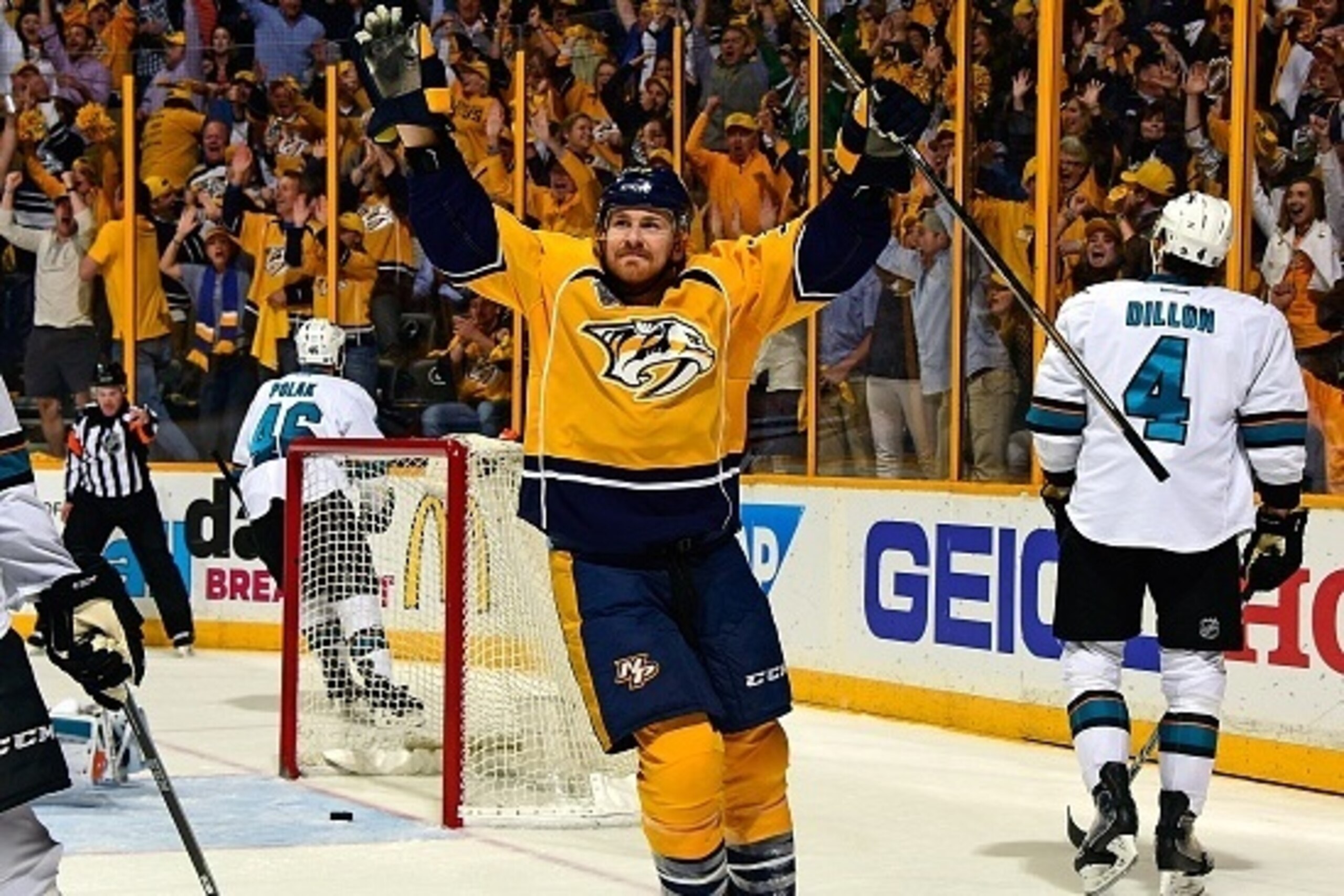 NASHVILLE, TN - MAY 09:  Colin Wilson #33 of the Nashville Predators holds his hands up in celebration after scoring the game tying goal during the third period of Game Six of the Western Conference Second Round against the San Jose Sharks during the 2016
