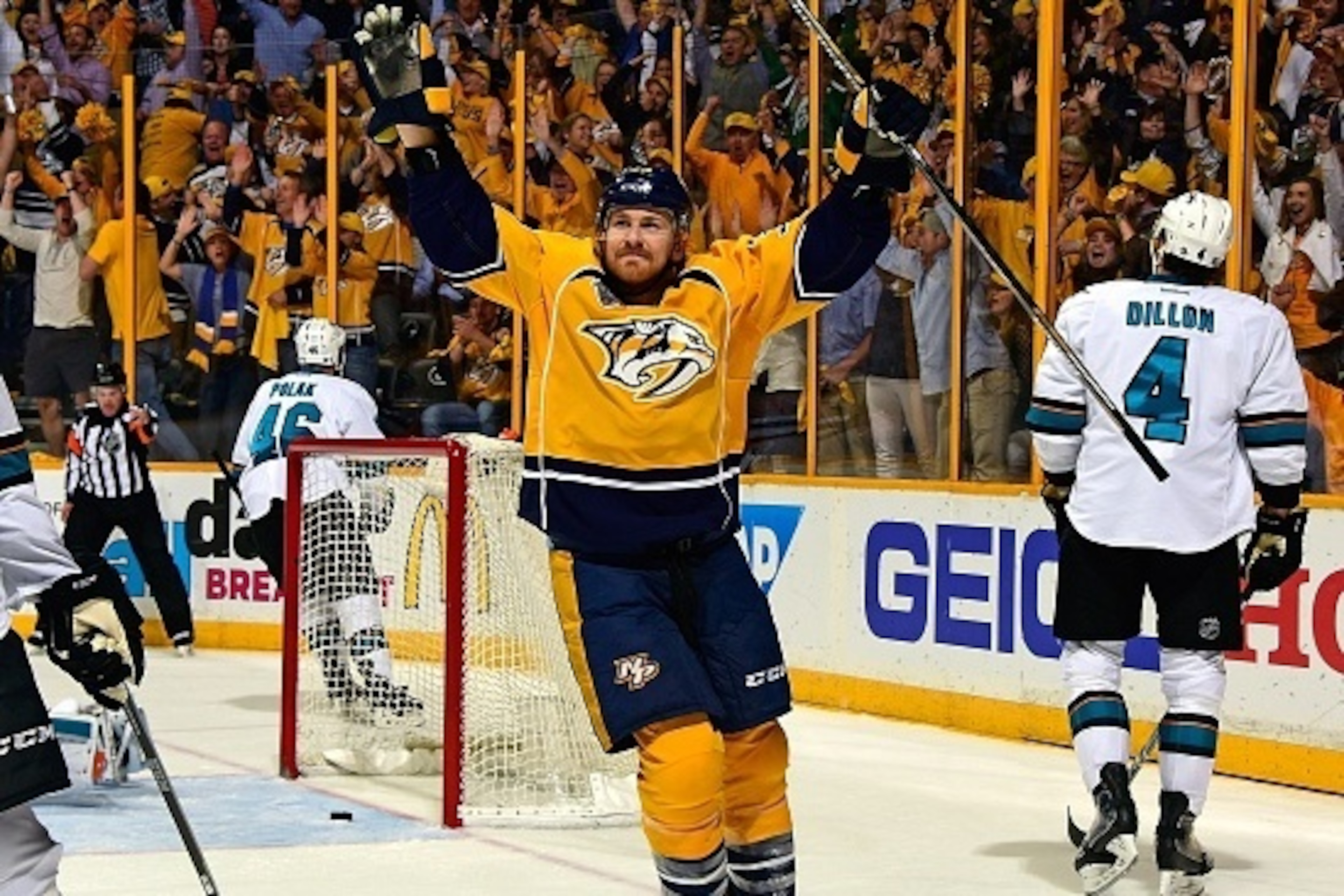 NASHVILLE, TN - MAY 09:  Colin Wilson #33 of the Nashville Predators holds his hands up in celebration after scoring the game tying goal during the third period of Game Six of the Western Conference Second Round against the San Jose Sharks during the 2016