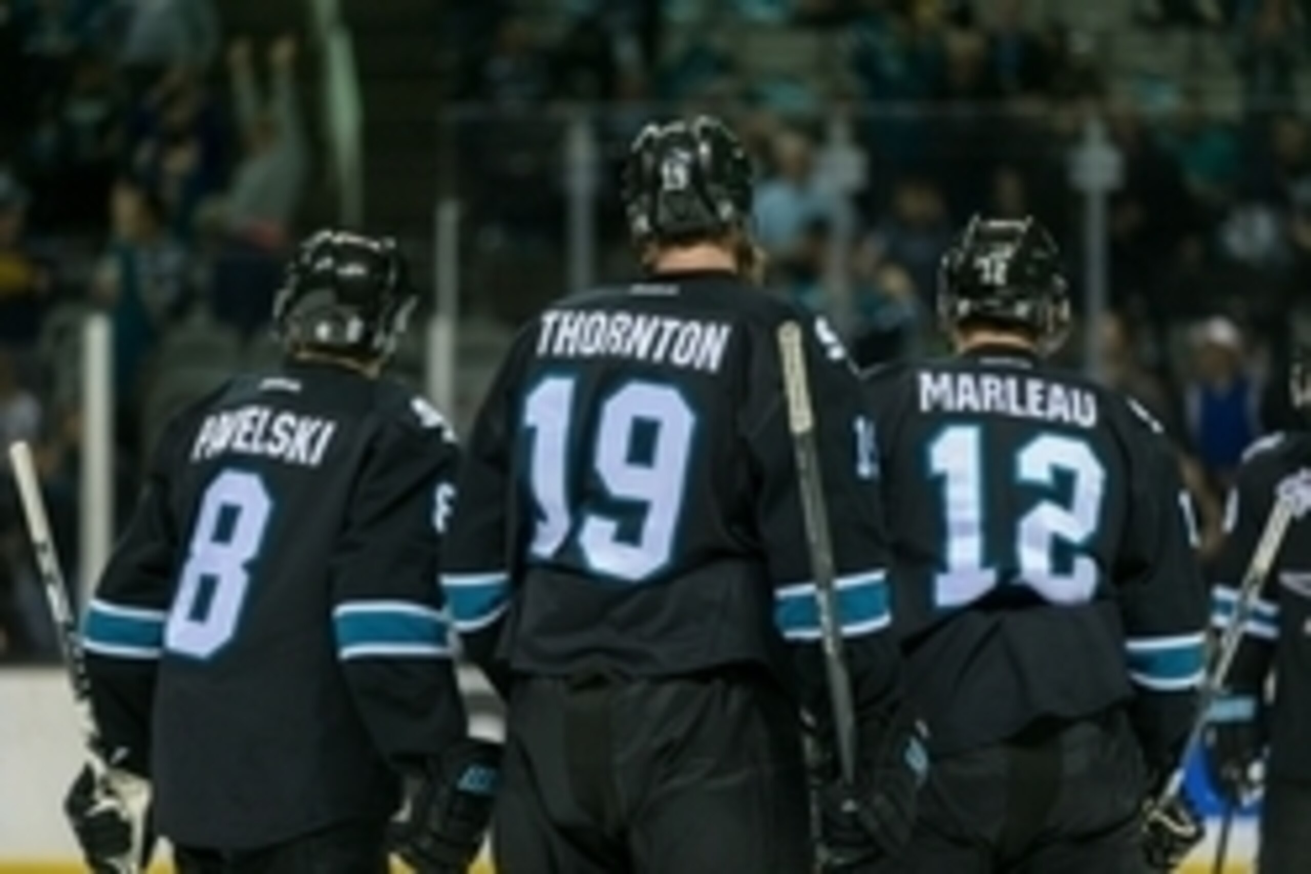 Apr 7, 2016; San Jose, CA, USA;  San Jose Sharks center Joe Thornton (19) celebrates scoring a goal against the Winnipeg Jets with center Patrick Marleau (12) and center Joe Pavelski (8) during the second period at SAP Center at San Jose. Mandatory Credit