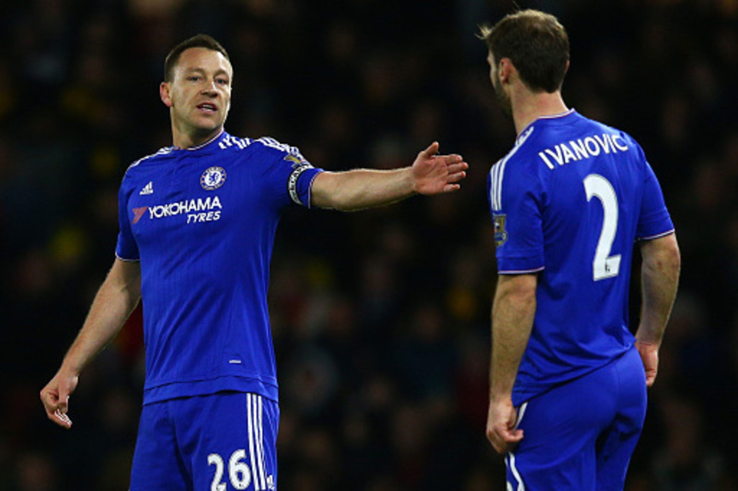 WATFORD, ENGLAND - FEBRUARY 03:  John Terry of Chelsea speaks with Branislav Ivanovic of Chelsea during the Barclays Premier League match between Watford and Chelsea at Vicarage Road on February 3, 2016 in Watford, England.  (Photo by Clive Mason/Getty Im