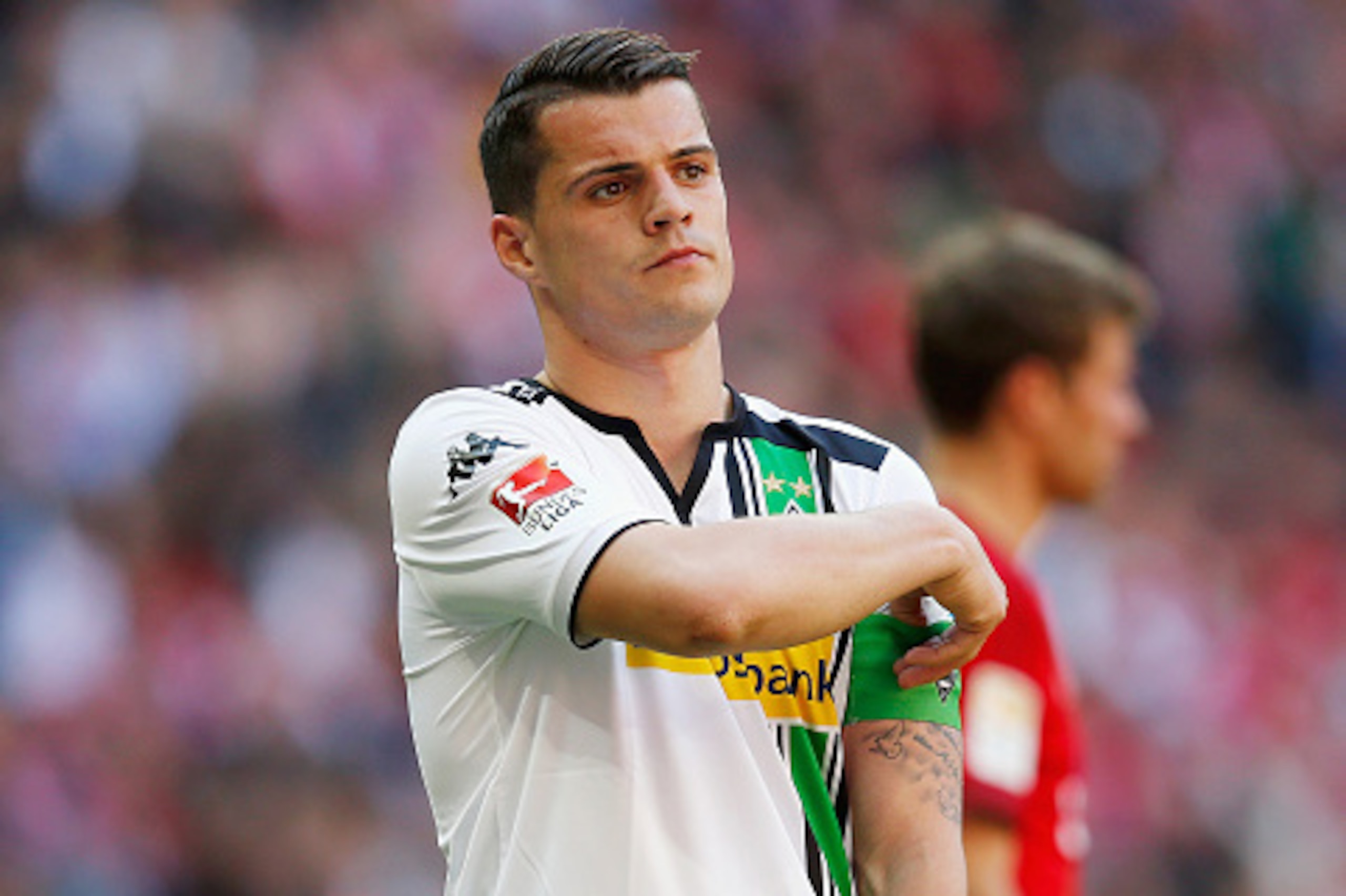 MUNICH, GERMANY - APRIL 30:  Granit Xhaka of Borussia Moenchengladbach reacts during the Bundesliga match between Bayern Muenchen and Borussia Moenchengladbach at Allianz Arena on April 30, 2016 in Munich, Germany.  (Photo by Boris Streubel/Getty Images)