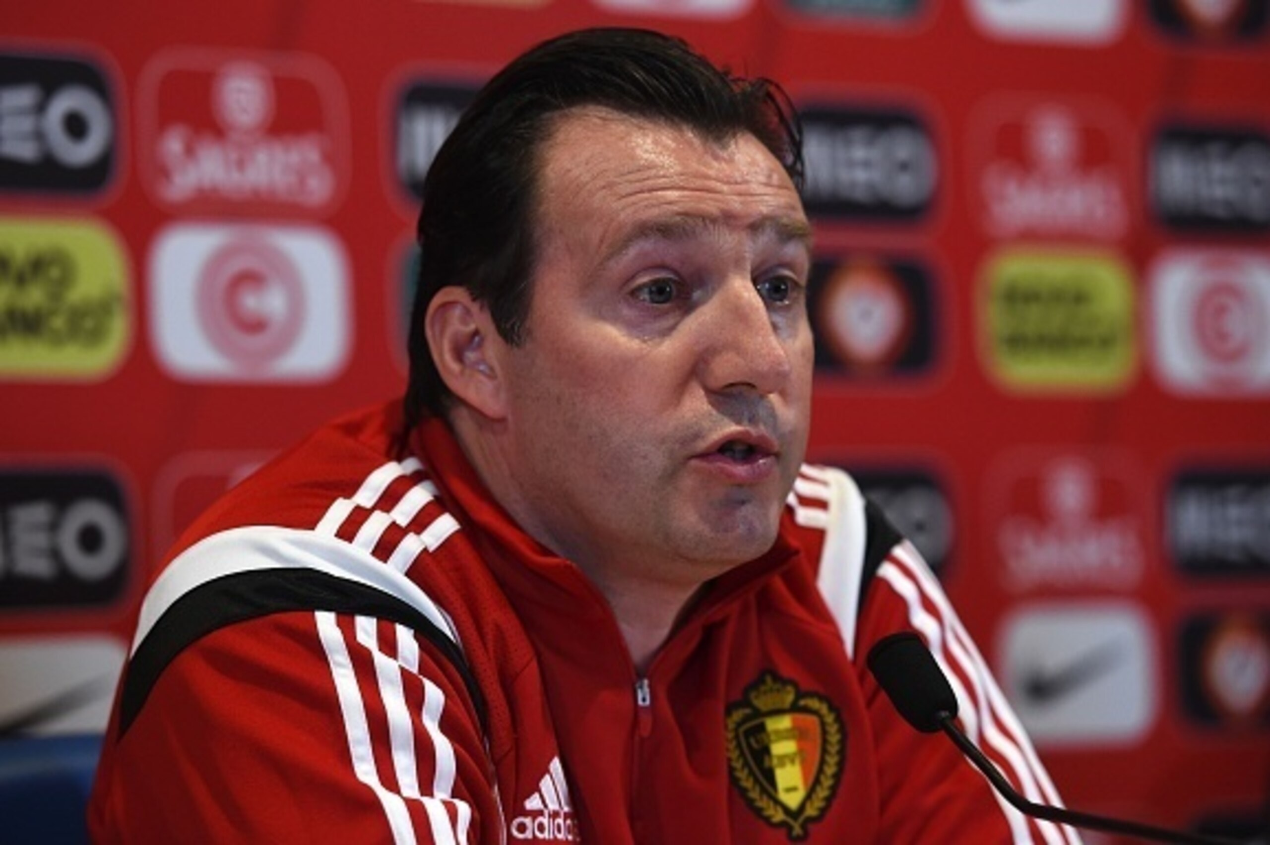 Belgian coach Marc Wilmots speaks during a press conference at Magalhaes Pessoa stadium in Leiria on March 28, 2016, on the eve of the friendly football match Portugal vs Begium in preparation for the upcoming EURO 2016.  / AFP / FRANCISCO LEONG        (P