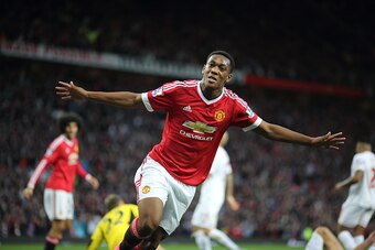 MANCHESTER, ENGLAND - SEPTEMBER 12:  Anthony Martial of Manchester United celebrates after scoring a goal to make it 3-1 on his debut during the Barclays Premier League match between Manchester United and Liverpool on September 12, 2015 in Manchester, Uni
