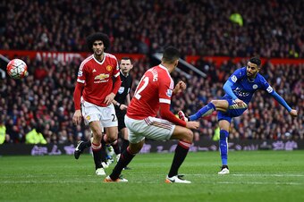 MANCHESTER, UNITED KINGDOM - MAY 01:  Riyad Mahrez of Leicester City shoots during the Barclays Premier League match between Manchester United and Leicester City at Old Trafford on May 1, 2016 in Manchester, England.  (Photo by Laurence Griffiths/Getty Im
