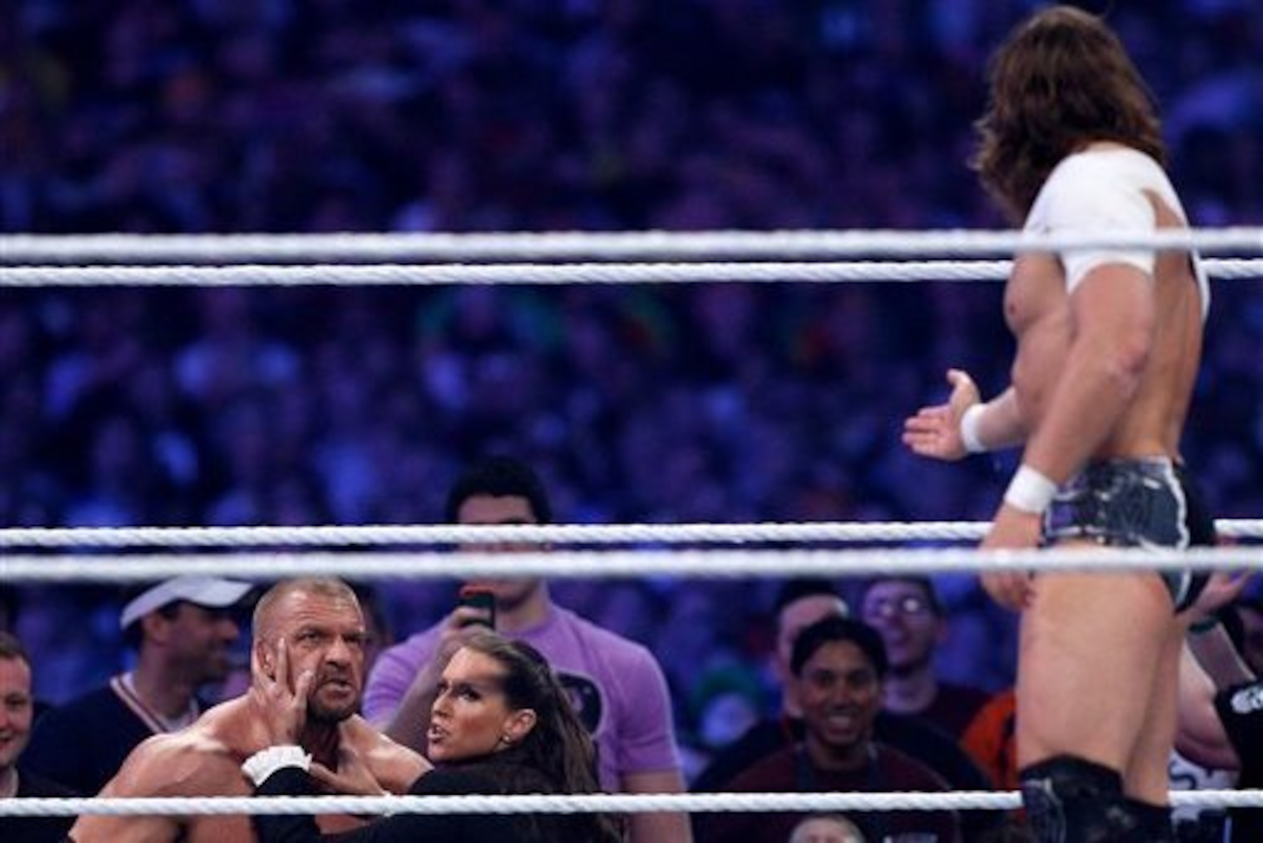 Triple H scowls at Daniel Bryan during their WrestleMania match.