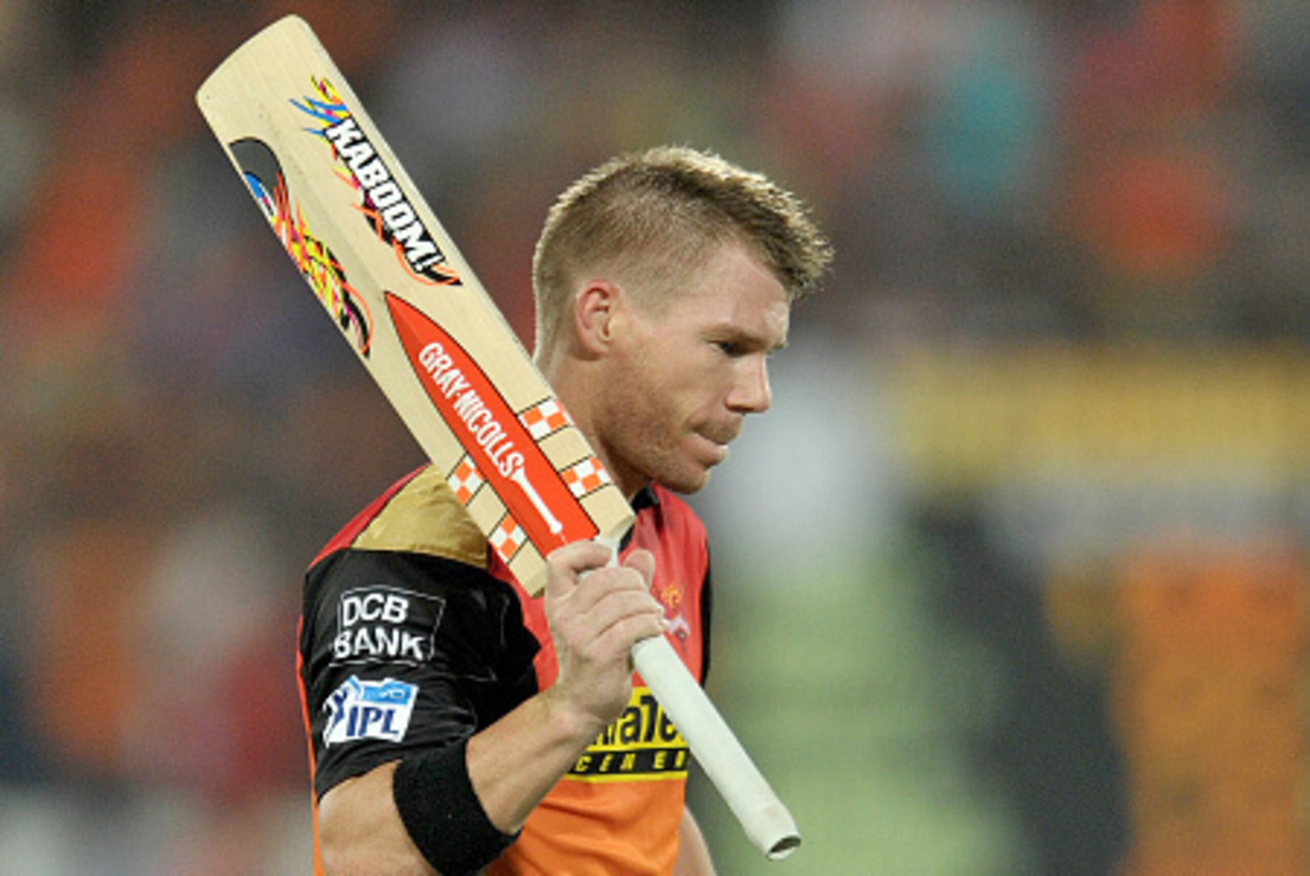 Sunrisers Hyderabad captain David Warner walks back to the pavilion after scoring 92 runs during the 2016 Indian Premier League (IPL) Twenty20 cricket match between Sunrisers Hyderabad and Royal Challengers Bangalore at The Rajiv Gandhi International Stad