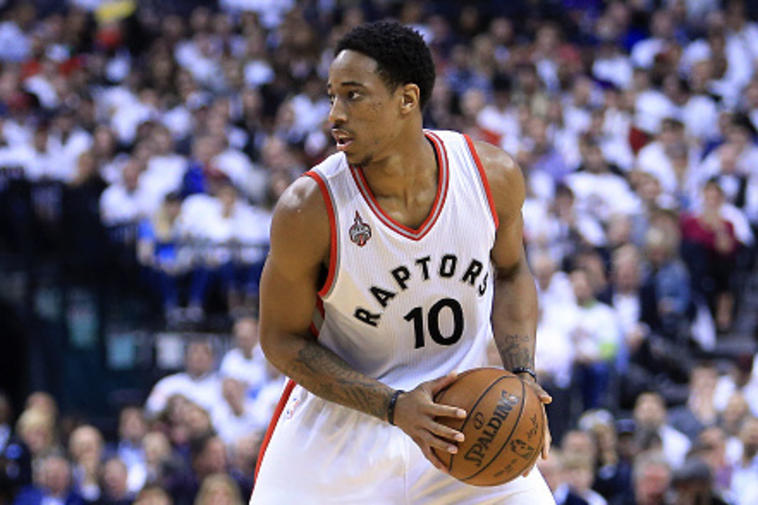TORONTO, ON - MAY 11:  DeMar DeRozan #10 of the Toronto Raptors dribbles the ball in the first half of Game Five of the Eastern Conference Semifinals against the Miami Heat during the 2016 NBA Playoffs at the Air Canada Centre on May 11, 2016 in Toronto, 
