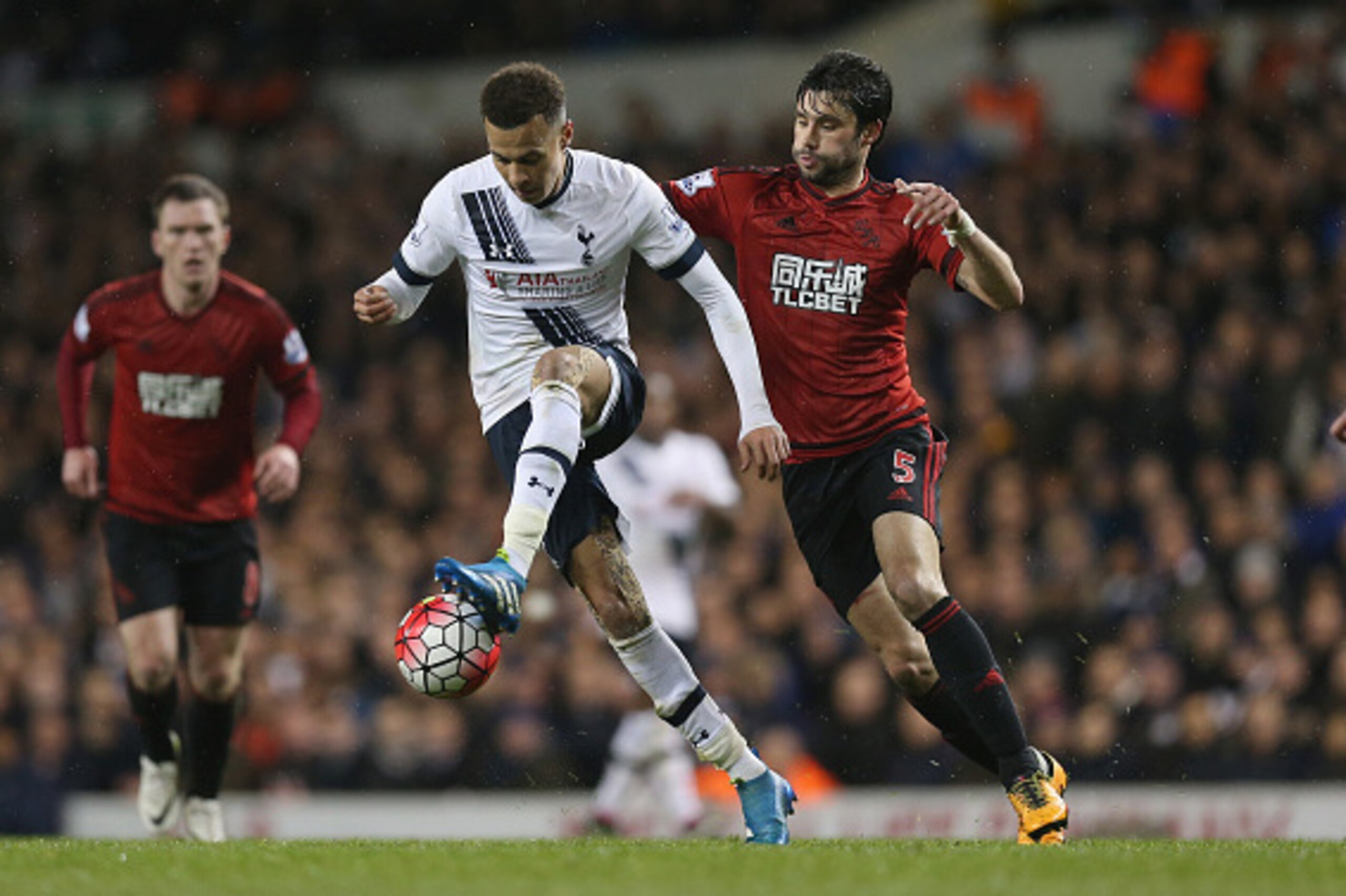 LONDON, ENGLAND - APRIL 25:  Dele Alli of Tottenham and Claudio Yacob of West bromwich Albion during the Barclays Premier League match between Tottenham Hotspur and West Bromwich Albion at White Hart Lane on April 25, 2016 in London, England.  (Photo by A