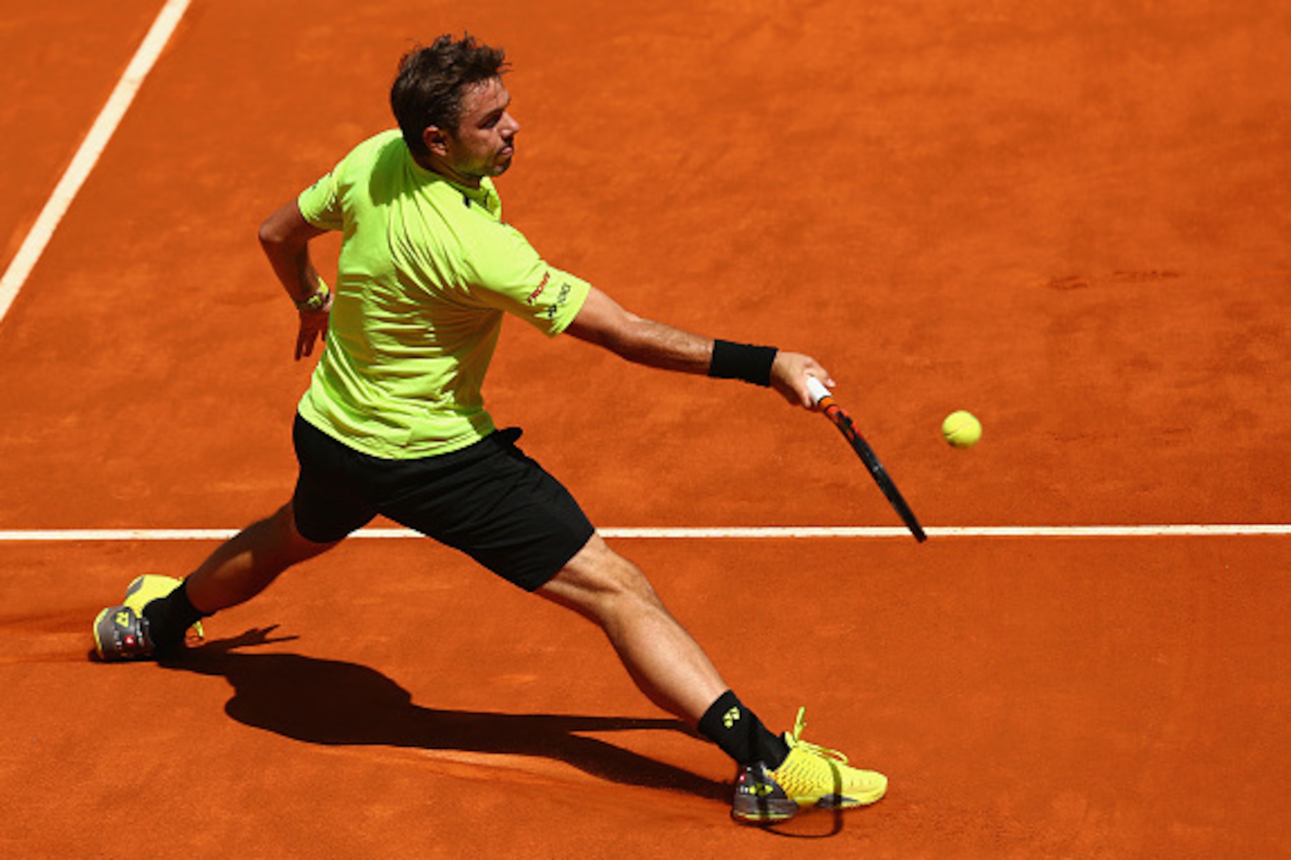 MADRID, SPAIN - MAY 04:  Stanislas Wawrinka of Switzerland in action against Nick Kyrgios of Australia in their second round match during day five of the Mutua Madrid Open tennis tournament at the Caja Magica on May 04, 2016 in Madrid.  (Photo by Clive Br