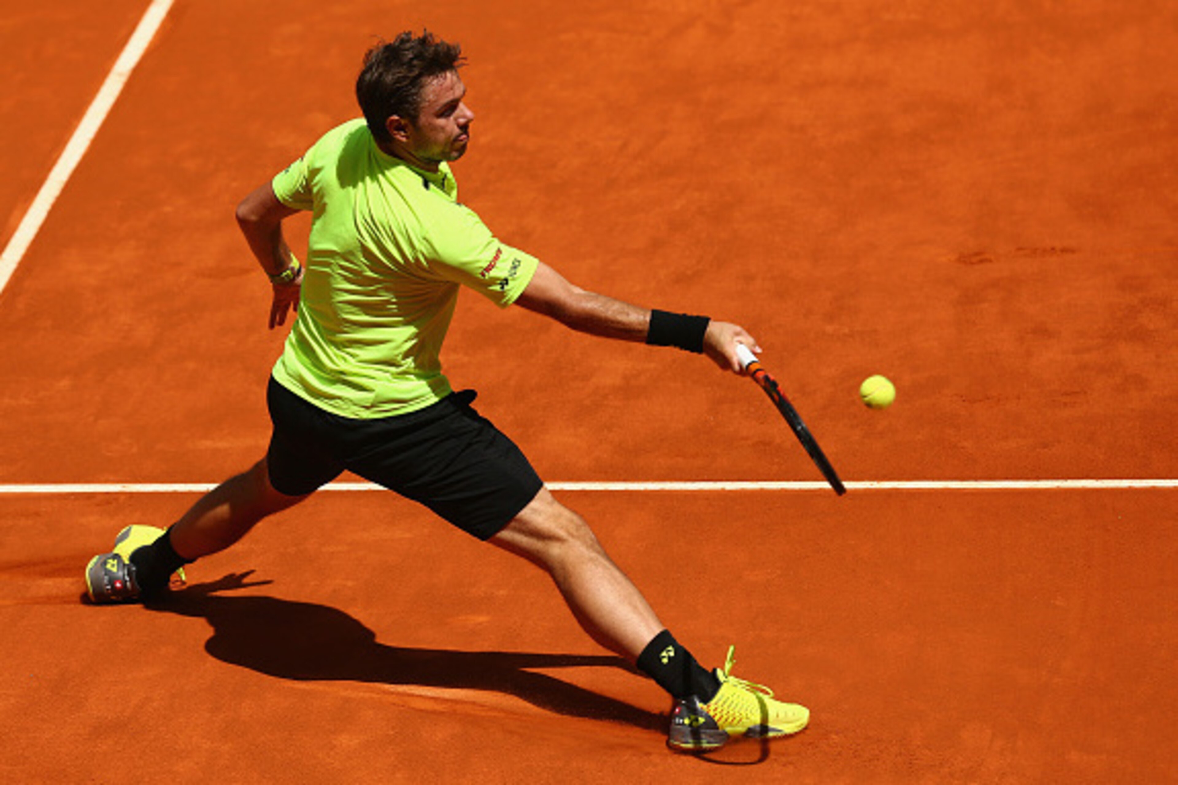 MADRID, SPAIN - MAY 04: Stanislas Wawrinka of Switzerland in action against Nick Kyrgios of Australia in their second round match during day five of the Mutua Madrid Open tennis tournament at the Caja Magica on May 04, 2016 in Madrid. (Photo by Clive Br MADRID, SPAIN - MAY 04: Stanislas Wawrinka of Switzerland in action against Nick Kyrgios of Australia in their second round match during day five of the Mutua Madrid Open tennis tournament at the Caja Magica on May 04, 2016 in Madrid. (Photo by Clive Br