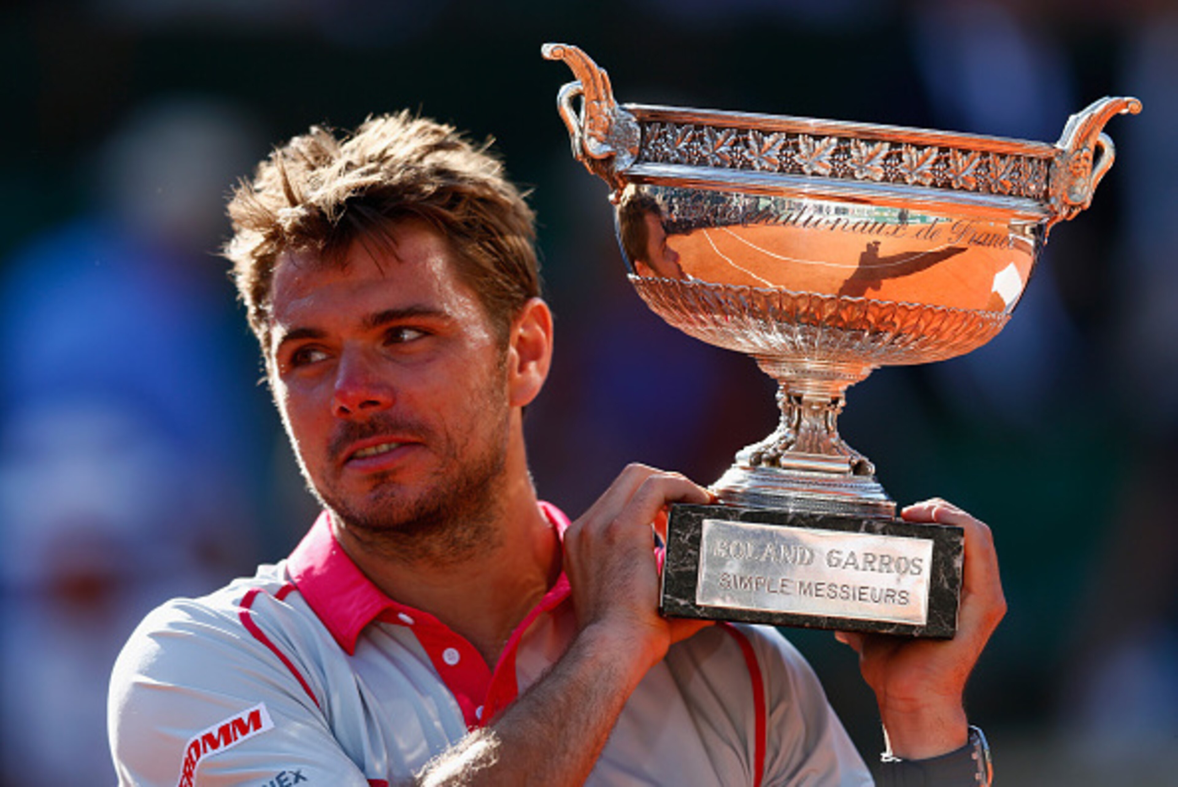 PARIS, FRANCE - JUNE 07: Stanislas Wawrinka of Switzerland holds the Coupe de Mousquetaires after victory in the Men's Singles Final against Novak Djokovic of Serbia on day fifteen of the 2015 French Open at Roland Garros on June 7, 2015 in Paris, France PARIS, FRANCE - JUNE 07: Stanislas Wawrinka of Switzerland holds the Coupe de Mousquetaires after victory in the Men's Singles Final against Novak Djokovic of Serbia on day fifteen of the 2015 French Open at Roland Garros on June 7, 2015 in Paris, France