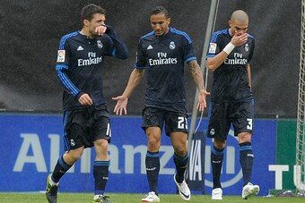 MADRID, SPAIN - APRIL 23:  Danilo (C),  Mateo Kovacic and Pepe of Real Madrid react after Rayo Vallecano scored their 2nd goal during the La Liga match between Rayo Vallecano and Real Madrid at Estadio de Vallecas on April 23, 2016 in Madrid, Spain.  (Pho