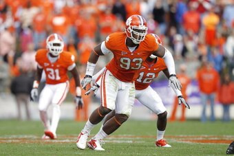 CLEMSON, SC - NOVEMBER 06: Da'Quan Bowers #93 of the Clemson Tigers pursues a play against the North Carolina State Wolfpack at Memorial Stadium on November 6, 2010 in Clemson, South Carolina. Clemson defeated North Carolina State 14-13. (Photo by Joe Rob