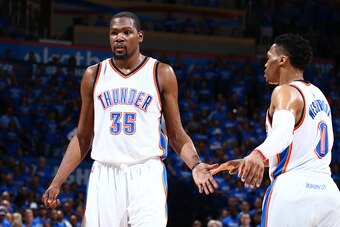 OKLAHOMA CITY, OK- MAY 12:  Kevin Durant #35 of the Oklahoma City Thunder shakes hands with Russell Westbrook #0 of the Oklahoma City Thunder during the game against the San Antonio Spurs in Game Six of the Western Conference Semifinals during the 2016 NB