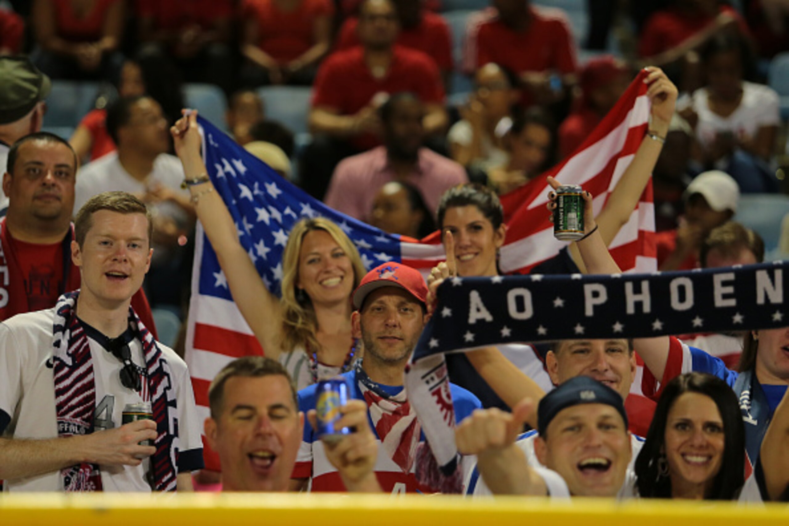 PORT OF SPAIN, TRINIDAD & TOBAGO - NOVEMBER 17: US Soccer fans show their support during a World Cup Qualifier between Trinidad and Tobago and USA as part of the FIFA World Cup Qualifiers for Russia 2018 at Hasely Crawford Stadium on November 17, 2015 in 
