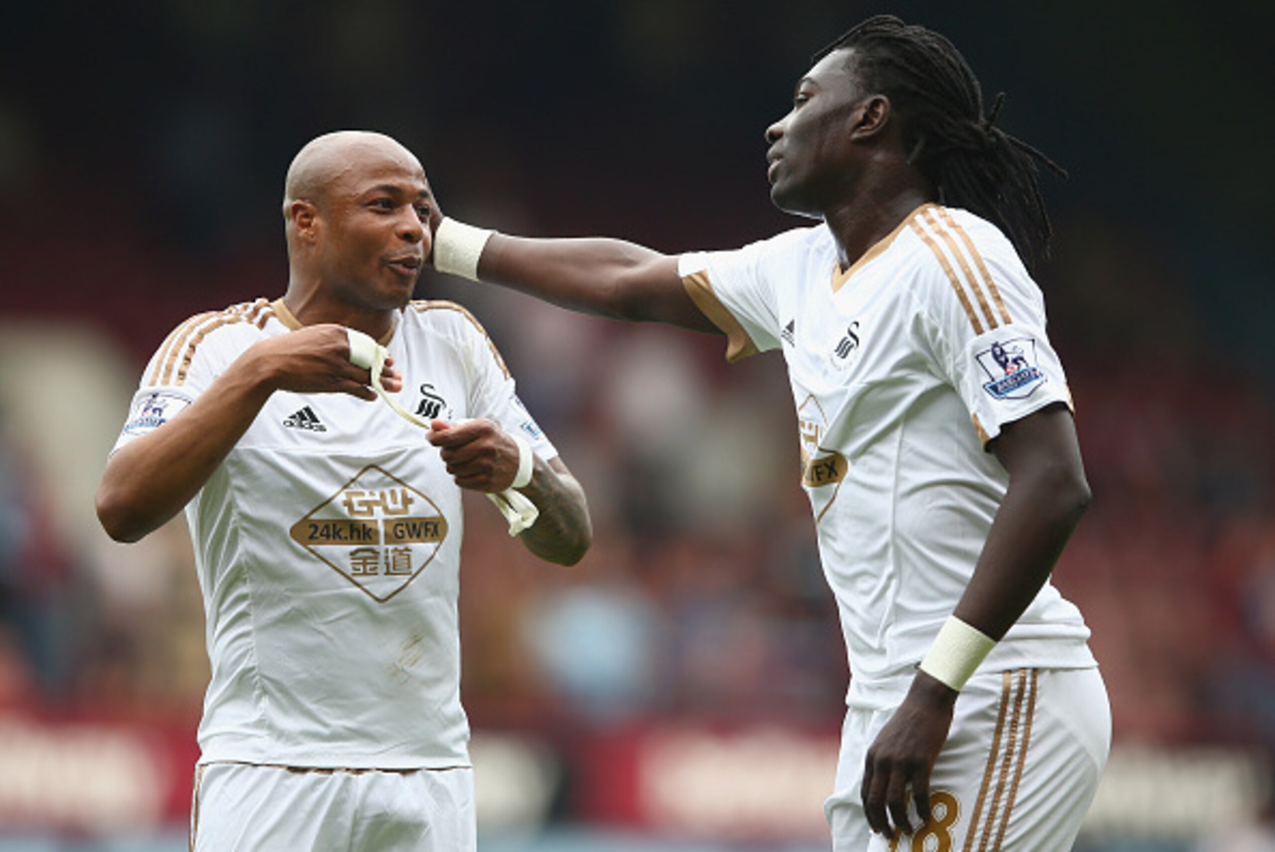 LONDON, ENGLAND - MAY 07: Bafetimbi Gomis of Swansea talks to Andre Ayew of Swansea during the Barclays Premier League match between West Ham United and Swansea City at the Boleyn Ground, May 7, 2016, London, England. (Photo by Paul Gilham/Getty Images) LONDON, ENGLAND - MAY 07: Bafetimbi Gomis of Swansea talks to Andre Ayew of Swansea during the Barclays Premier League match between West Ham United and Swansea City at the Boleyn Ground, May 7, 2016, London, England. (Photo by Paul Gilham/Getty Images)