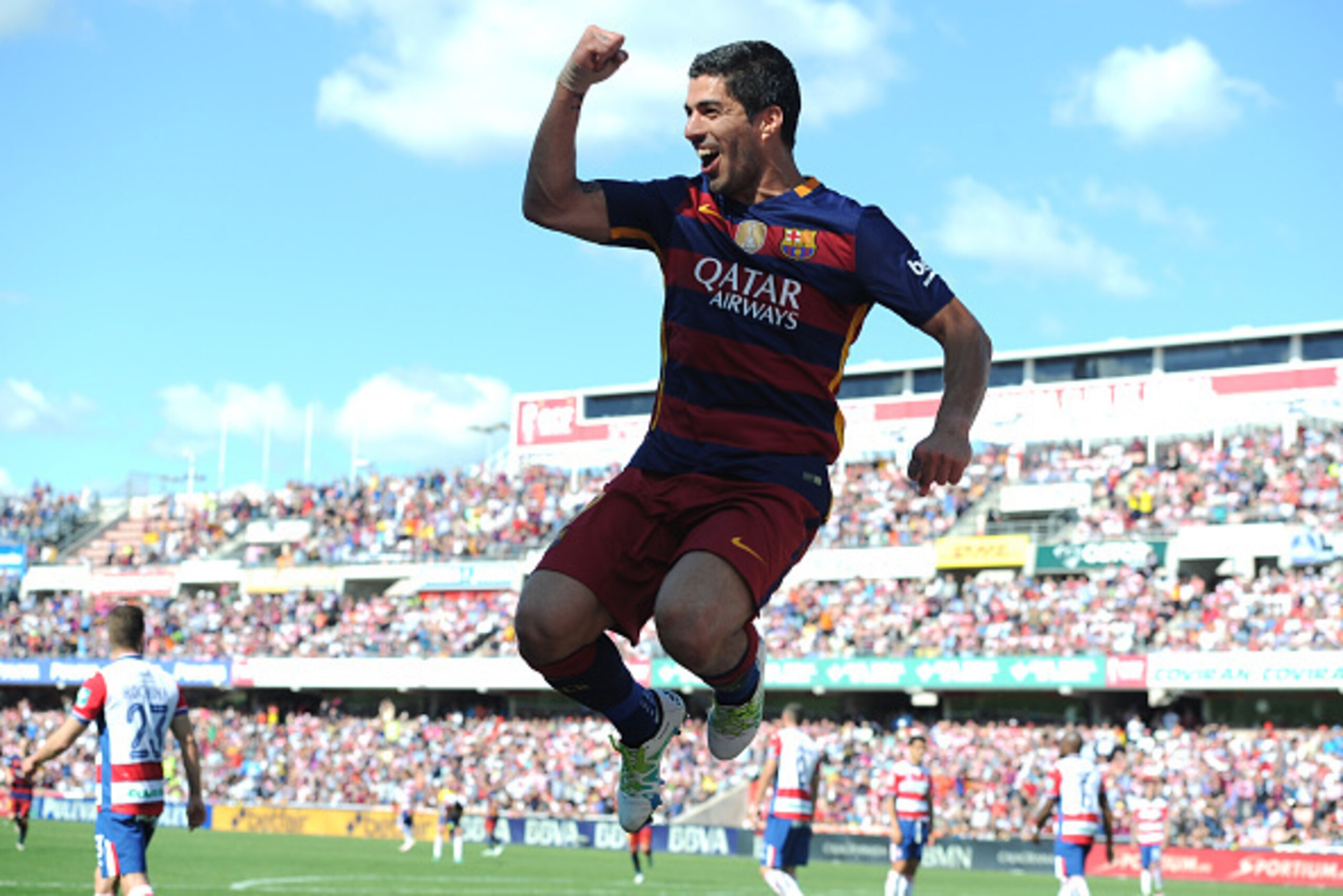 GRANADA, SPAIN - MAY 14:  Luis Suarez of Barcelona celebrates scoring his team's second goal during the La Liga match between Granada and Barcelona at Estadio Nuevo Los Carmenes on May 14, 2016 in Granada, Spain.  (Photo by Denis Doyle/Getty Images)