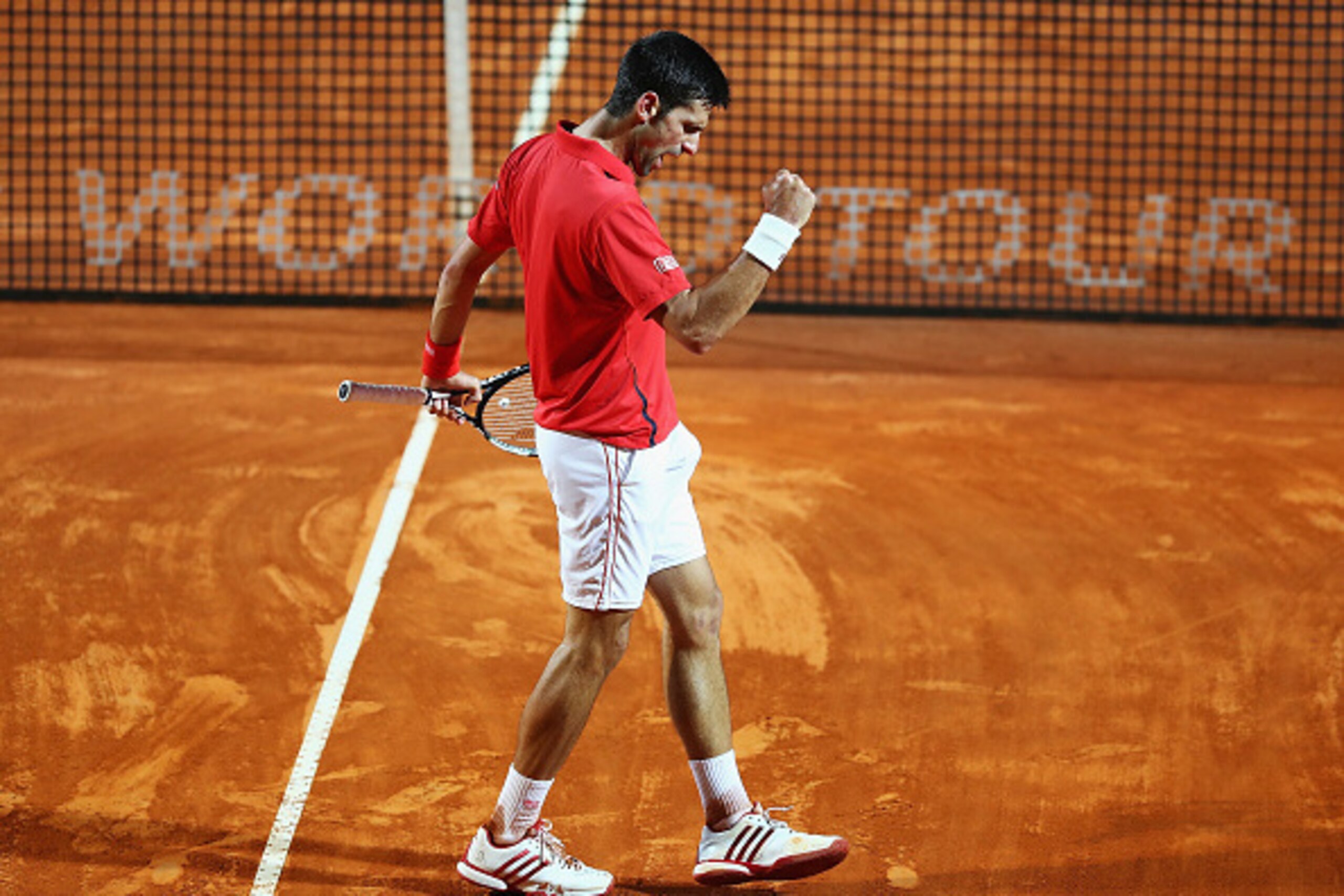 ROME, ITALY - MAY 14:  Novak Djokovic of Serbia celebrates a point during his match against Kei Nishikori of Japan during day seven of The Internazionali BNL d'Italia 2016 on May 14, 2016 in Rome, Italy.  (Photo by Matthew Lewis/Getty Images)