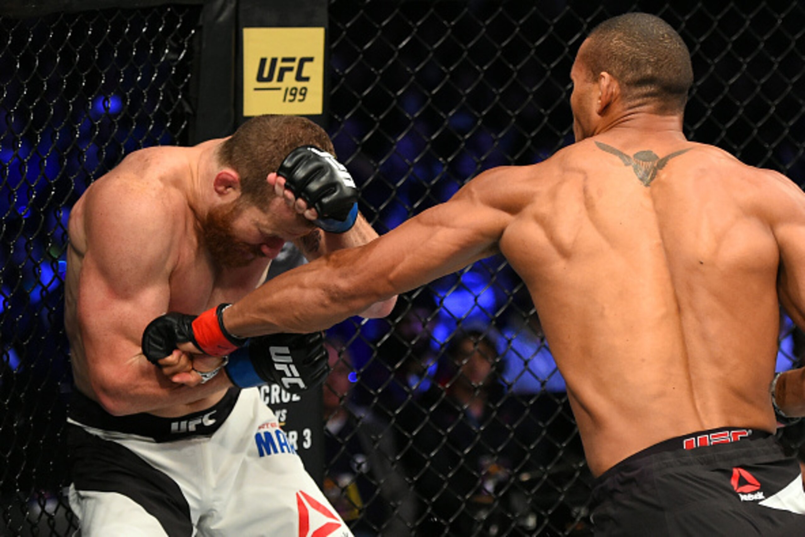 CURITIBA, BRAZIL - MAY 14:  (R-L) Thiago Santos of Brazil punches Nate Marquardt in their middleweight bout during the UFC 198 event at Arena da Baixada stadium on May 14, 2016 in Curitiba, Parana, Brazil.  (Photo by Josh Hedges/Zuffa LLC/Zuffa LLC via Ge
