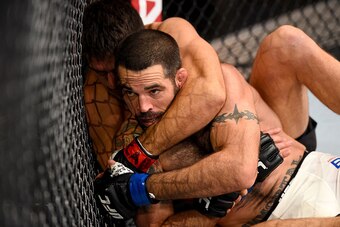 CURITIBA, BRAZIL - MAY 14:  (L-R) Demian Maia of Brazil controls the body of Matt Brown in their welterweight bout during the UFC 198 event at Arena da Baixada stadium on May 14, 2016 in Curitiba, Parana, Brazil.  (Photo by Josh Hedges/Zuffa LLC/Zuffa LLC