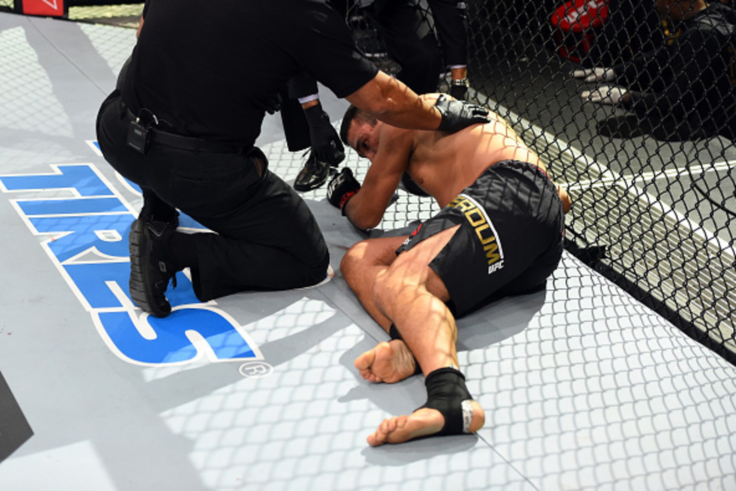 CURITIBA, BRAZIL - MAY 14:  Fabricio Werdum of Brazil recovers after being knocked out by Stipe Miocic in their UFC heavyweight championship bout during the UFC 198 event at Arena da Baixada stadium on May 14, 2016 in Curitiba, Parana, Brazil.  (Photo by 