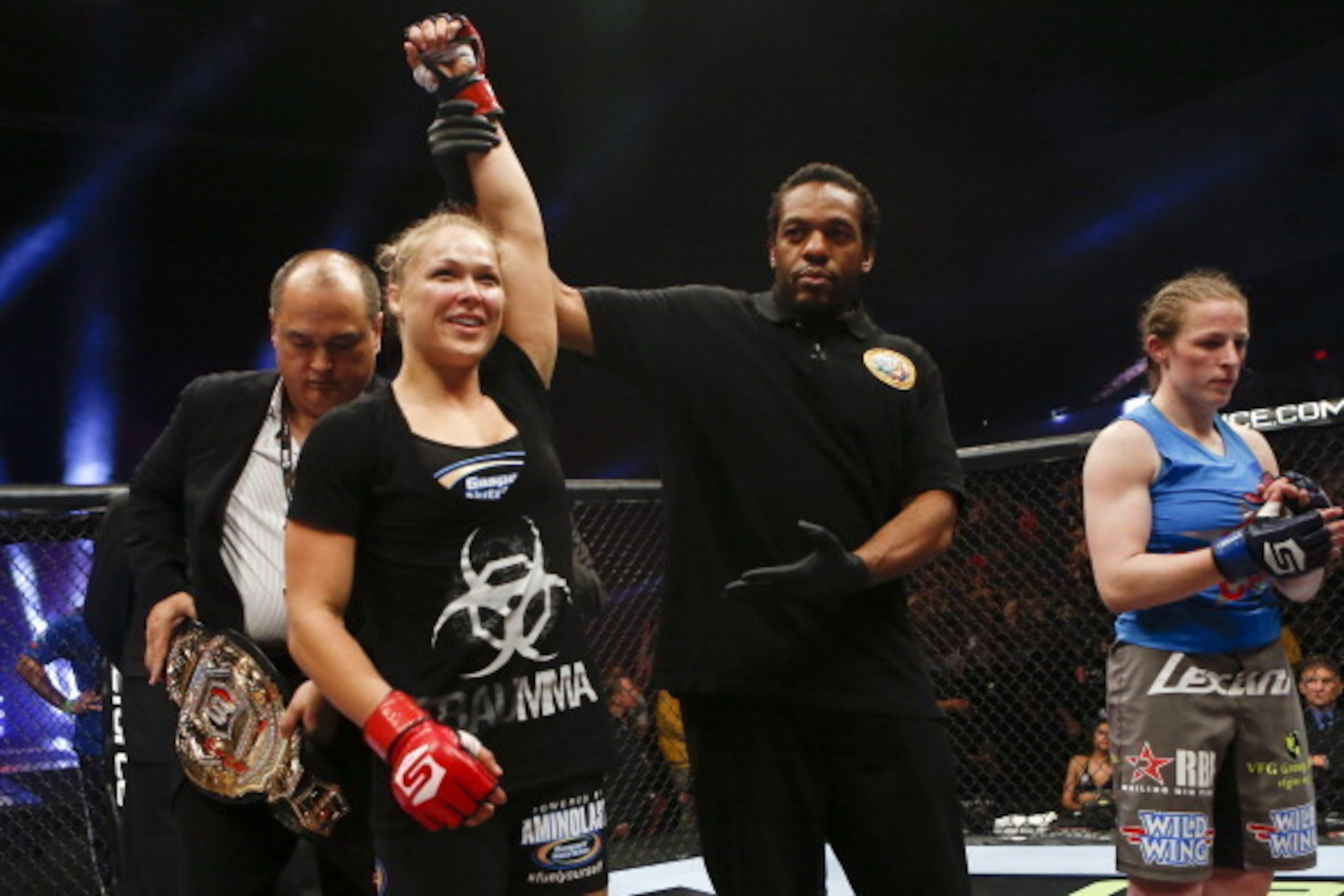 SAN DIEGO, CA - AUGUST 18:  (L-R) Ronda Rousey reacts after defeating Sarah Kaufman by submission during the Strikeforce event at Valley View Casino Center on August 18, 2012 in San Diego, California. (Photo by Esther Lin/Forza LLC/Forza LLC via Getty Ima
