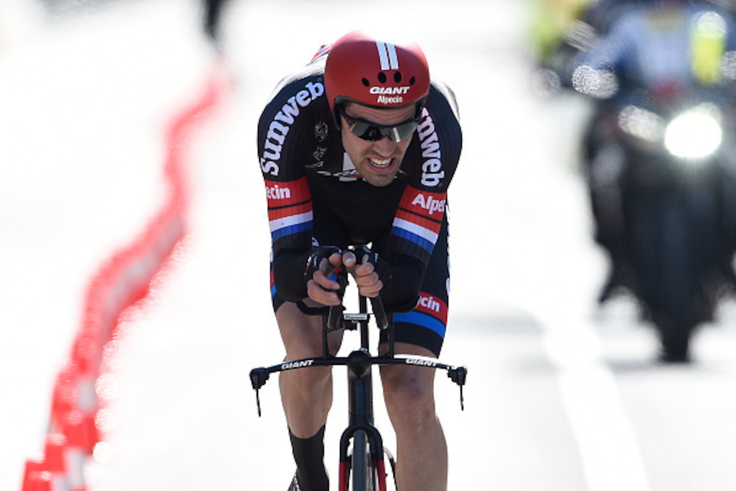 Netherlands' Tom Dumoulin of the TGA team takes second place of the fourth stage of the 70th Tour de Romandie UCI World Tour cycling race, a 15 km individual time-trial, in Sion on April 29, 2016, in Lausanne. / AFP / Alain Grosclaude        (Photo credit