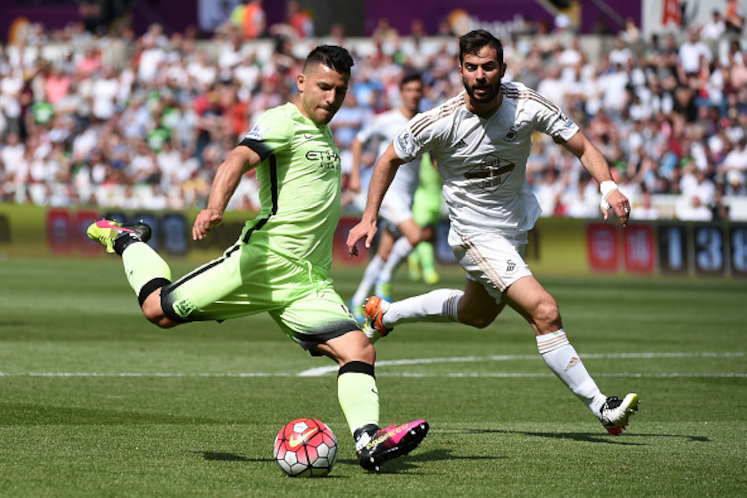SWANSEA, WALES - MAY 15:  Sergio Aguero of Manchester City shoots at goal during the Barclays Premier League match between Swansea City and Manchester City at the Liberty Stadium on May 15, 2016 in Swansea, Wales.  (Photo by Tom Dulat/Getty Images)