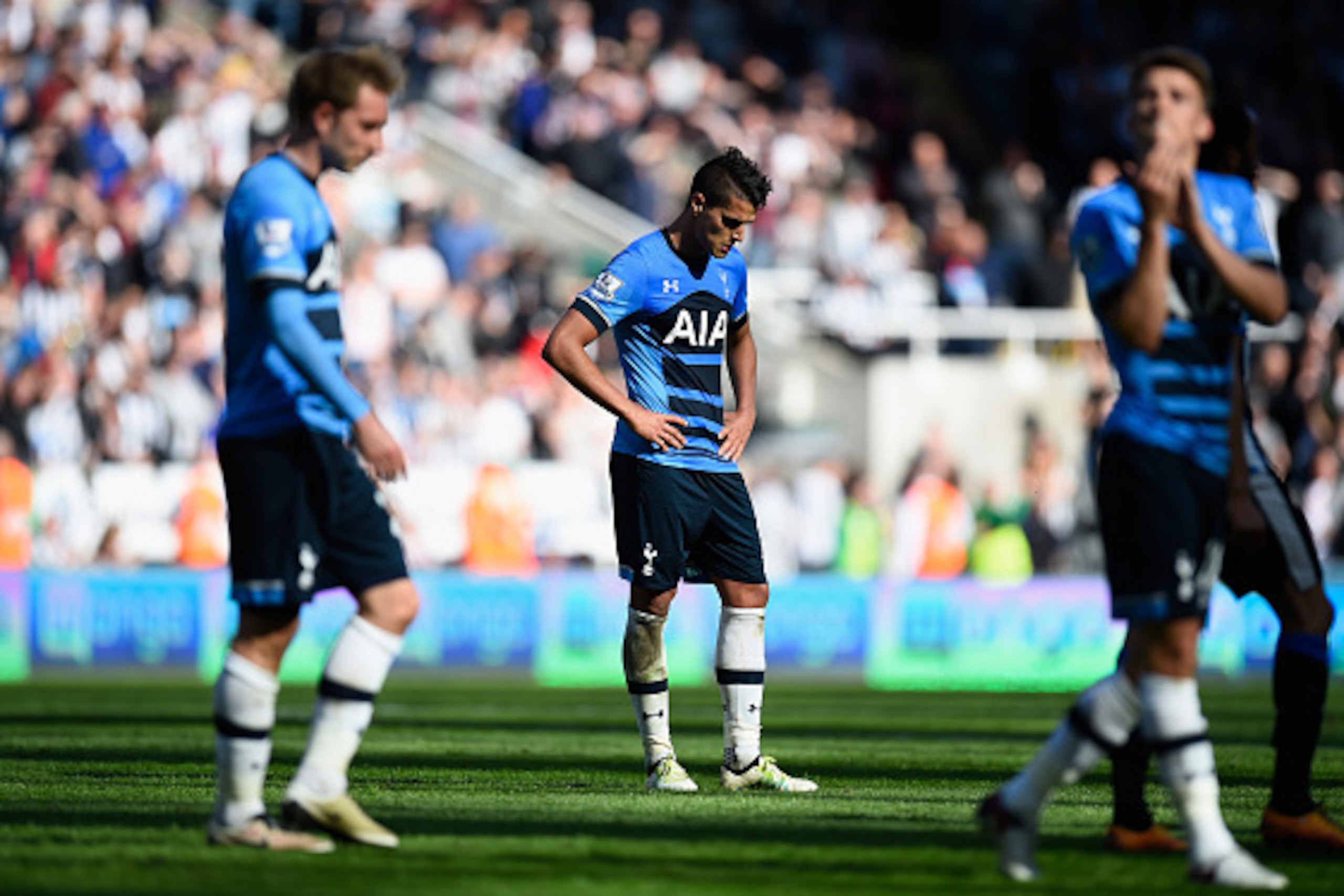 NEWCASTLE UPON TYNE, ENGLAND - MAY 15:  Erik Lamela (c) of Tottenham Hotspur looks dejected after  the Premier League match between Newcastle United and Tottenham Hotspur at St James' Park on May 15, 2016 in Newcastle upon Tyne, England.  (Photo by Stu Fo